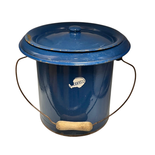 Blue metal bucket with a handle on a white background