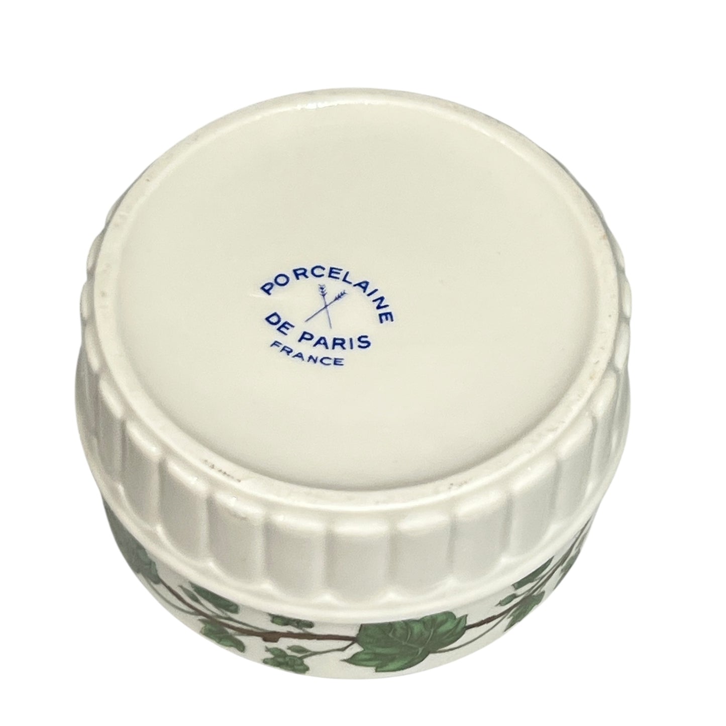 Porcelain container with 'Porcelaine de Paris France' branding on a white background