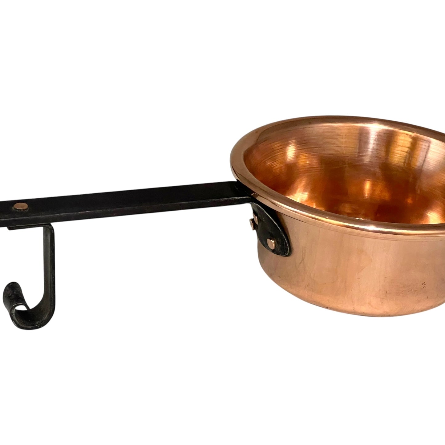 Copper pot with a black handle on a white background