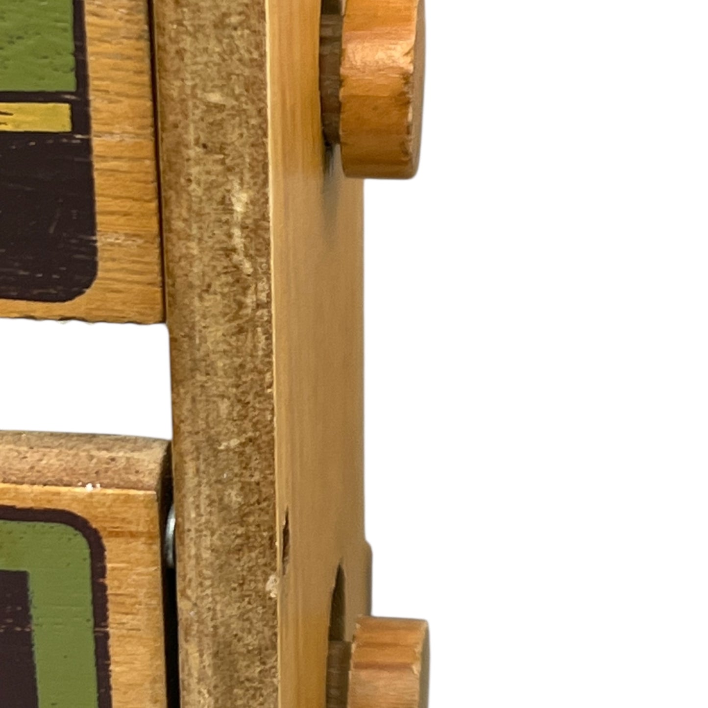 close up of French paper towel dispenser on a white background