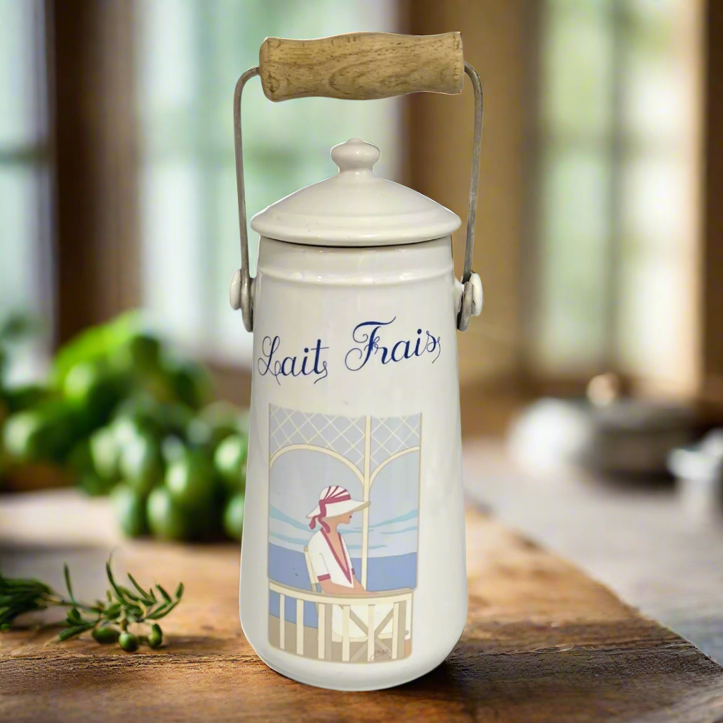 Decorative French vintage milk churn with Lair Frais text on the front on a wooden surface for sale from All Things French Store