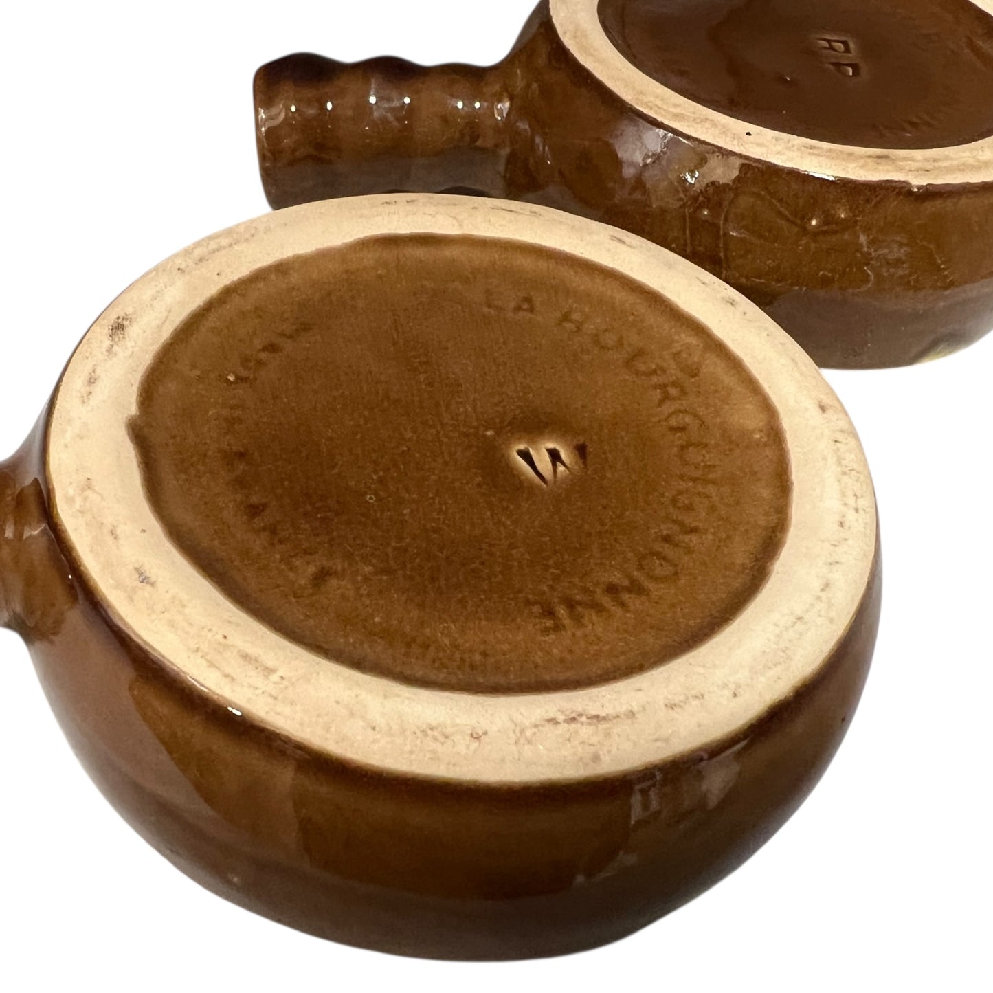 close up image of escargots plate makers stamp