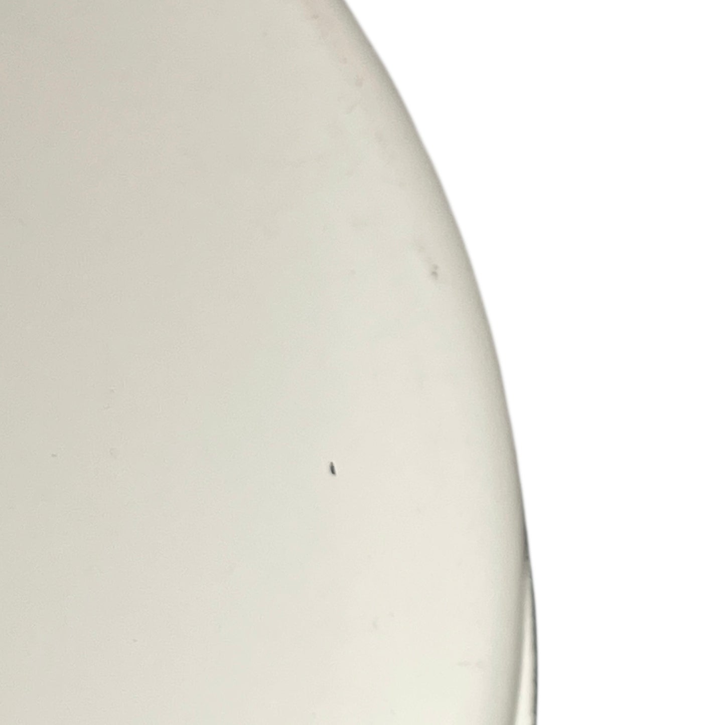 Close-up of a white frying pan on a white background
