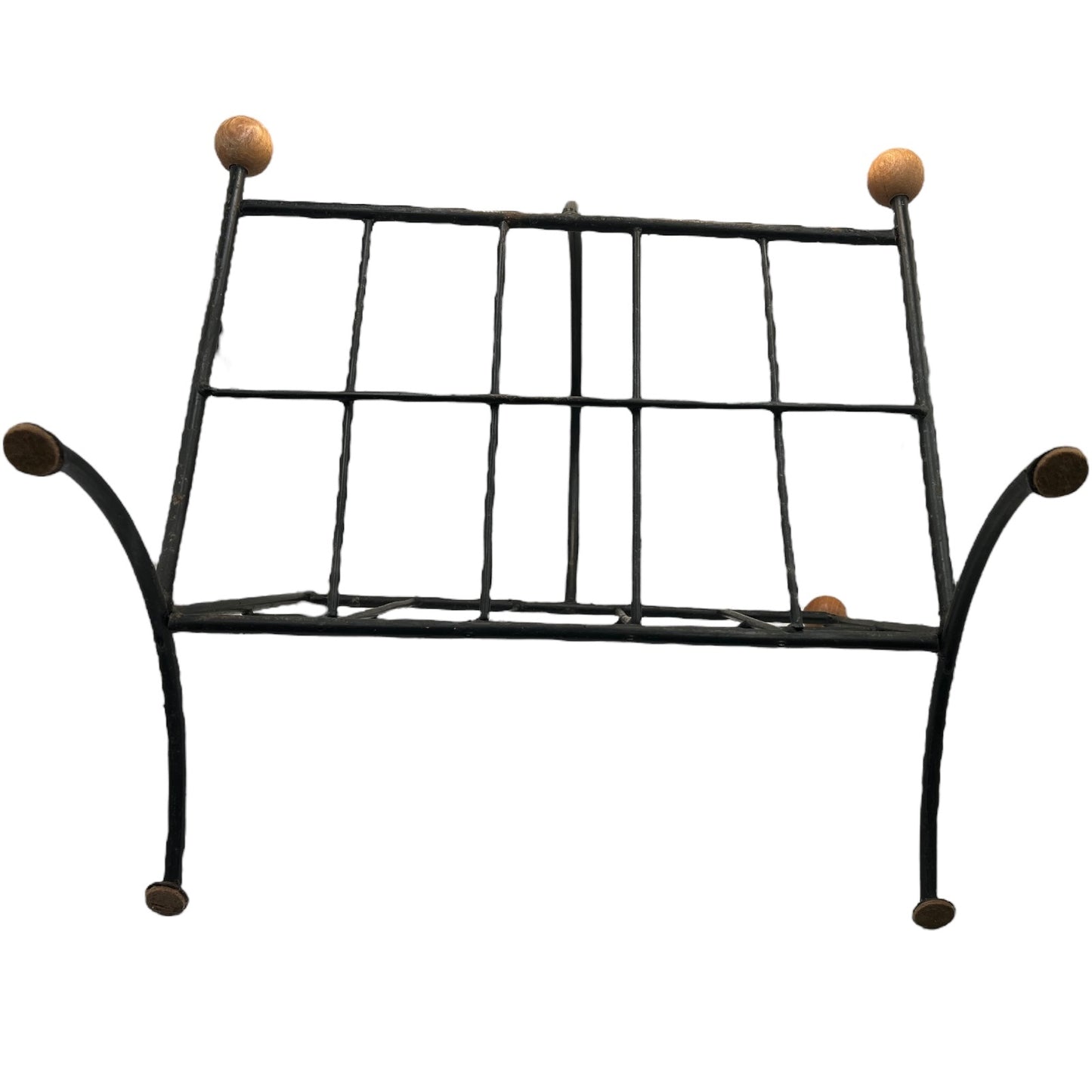 Close-up of a black metal stand on a white background