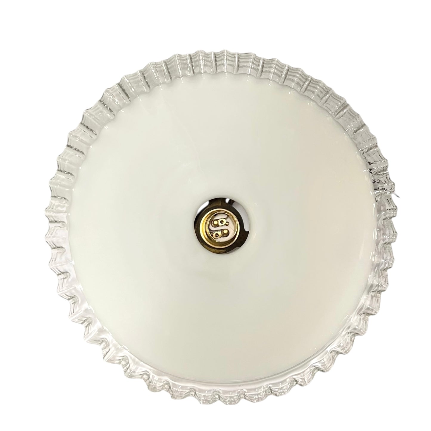 close up of brass ceiling light fixture with white glass shade on a white background