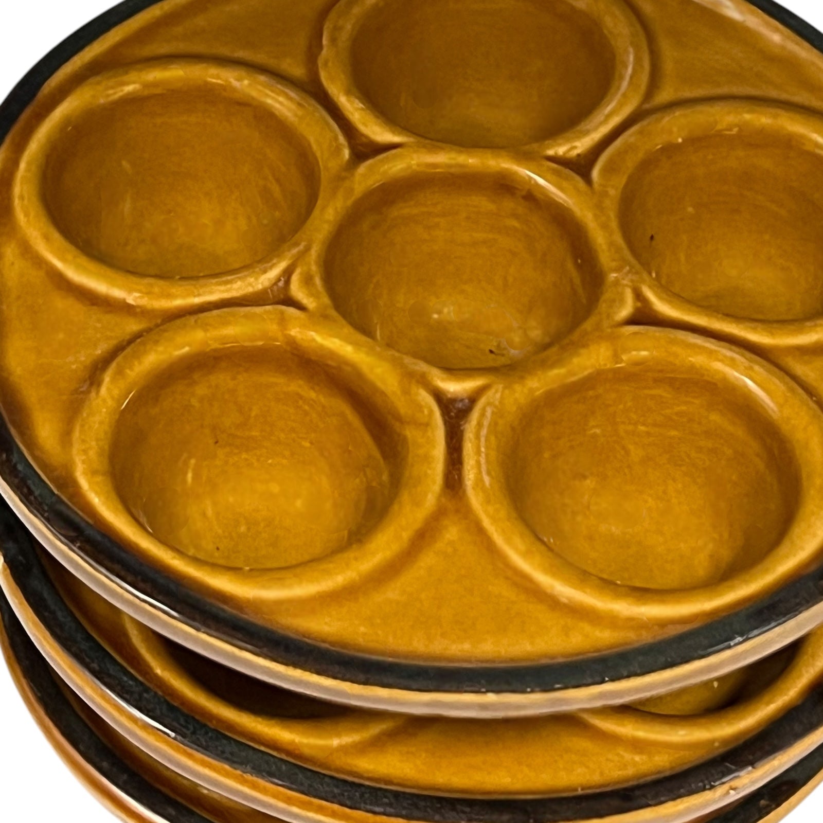 detail view of Vintage Snail Pots Plates