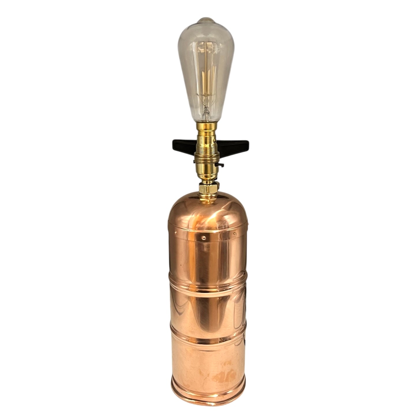 Copper lamp with vintage-style light bulb on a white background