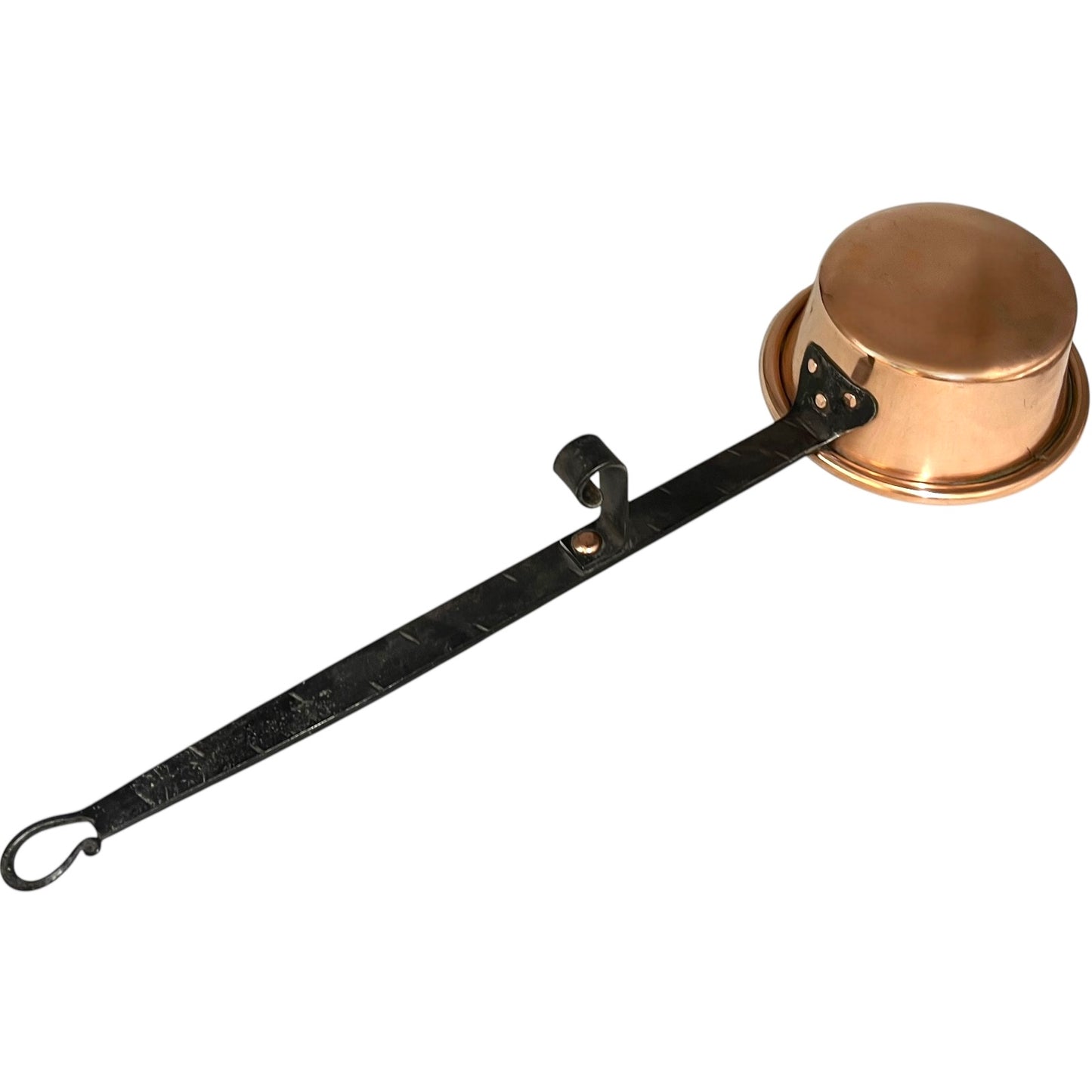 Copper pan with black handle on a white background