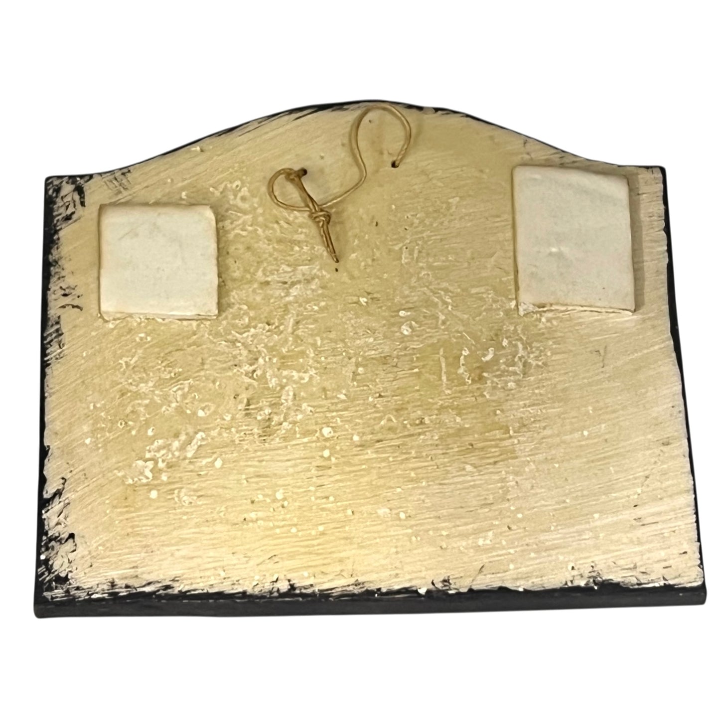 Close-up of a vintage bathroom door sign on a white background