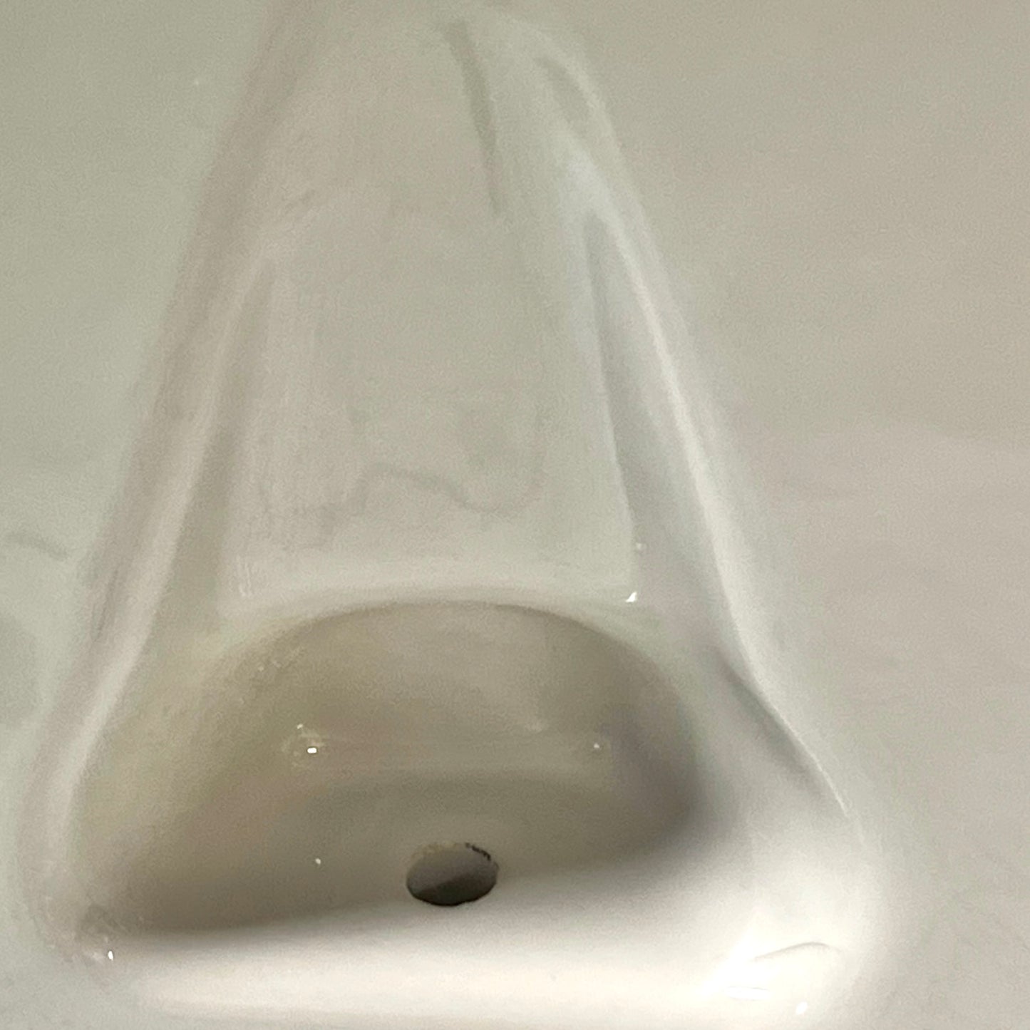 White ceramic shelf on a white background