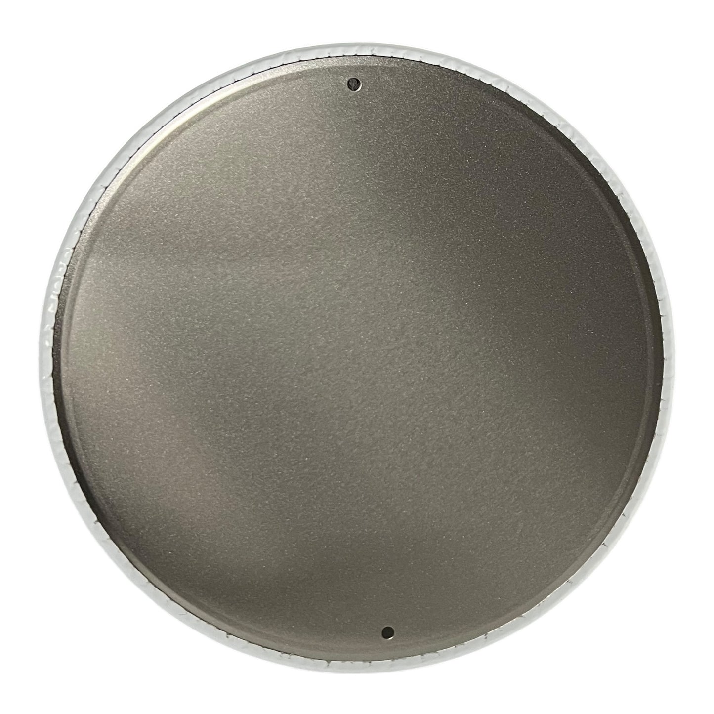 Round metallic object with a silver rim on a white background