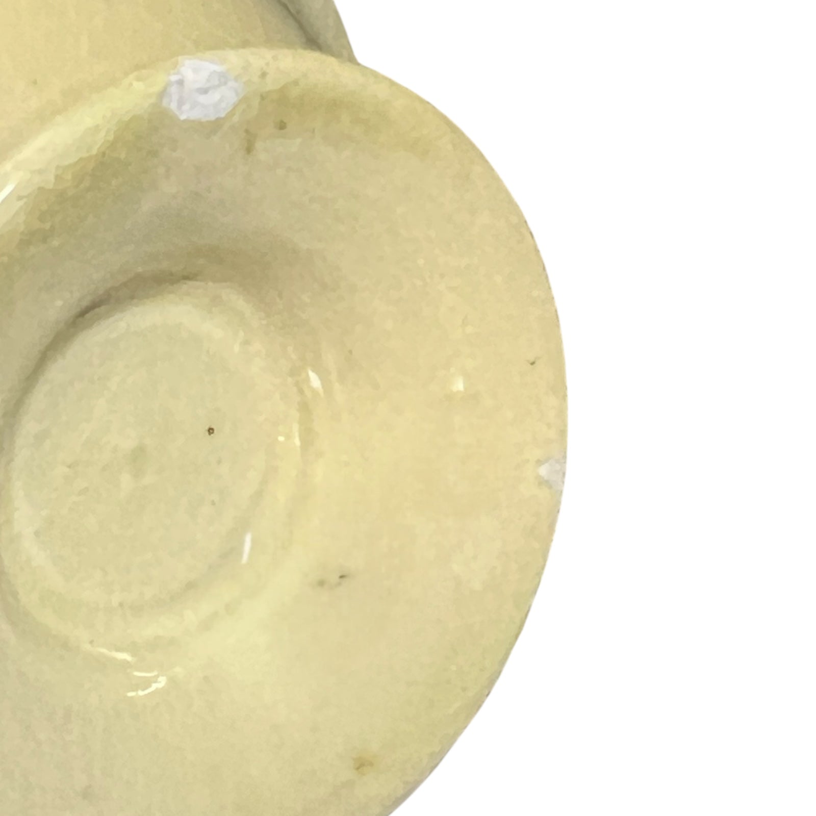 close up of chip on the bottom of a cup