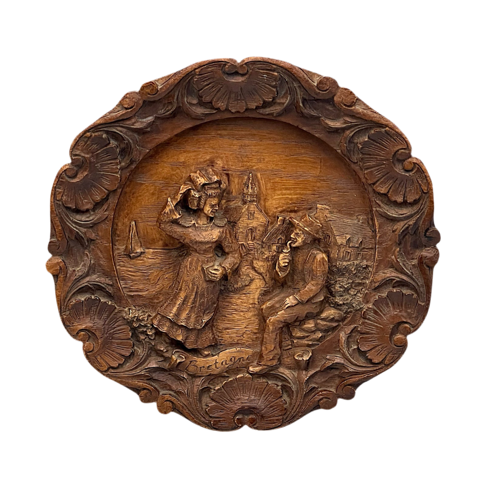 Wooden relief sculpture with intricate carvings on a white background