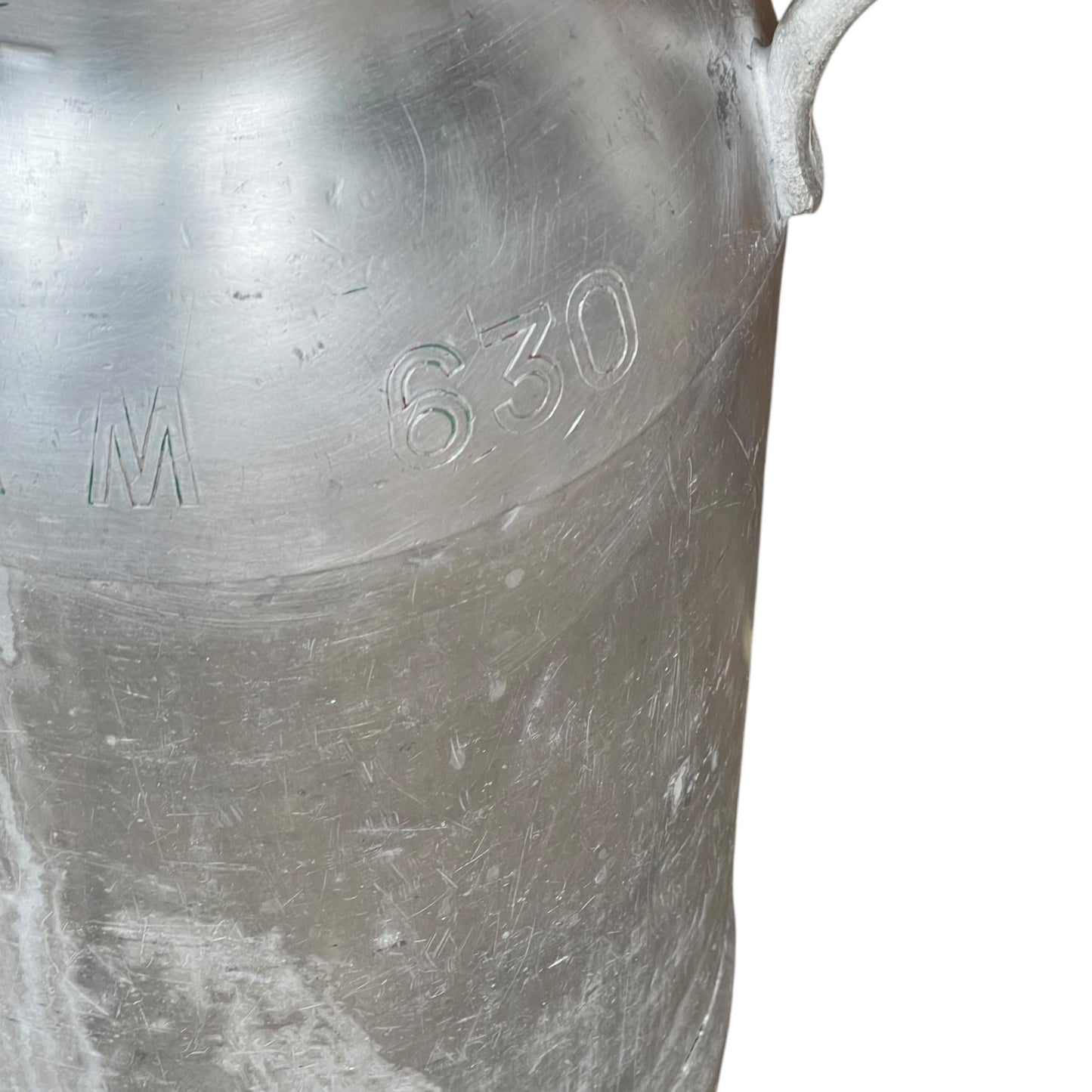 close up of milk churn