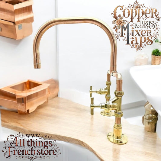 A copper and brass mixer tap with an arched spout and brass fittings, polished finish for sale by All Things French Store.