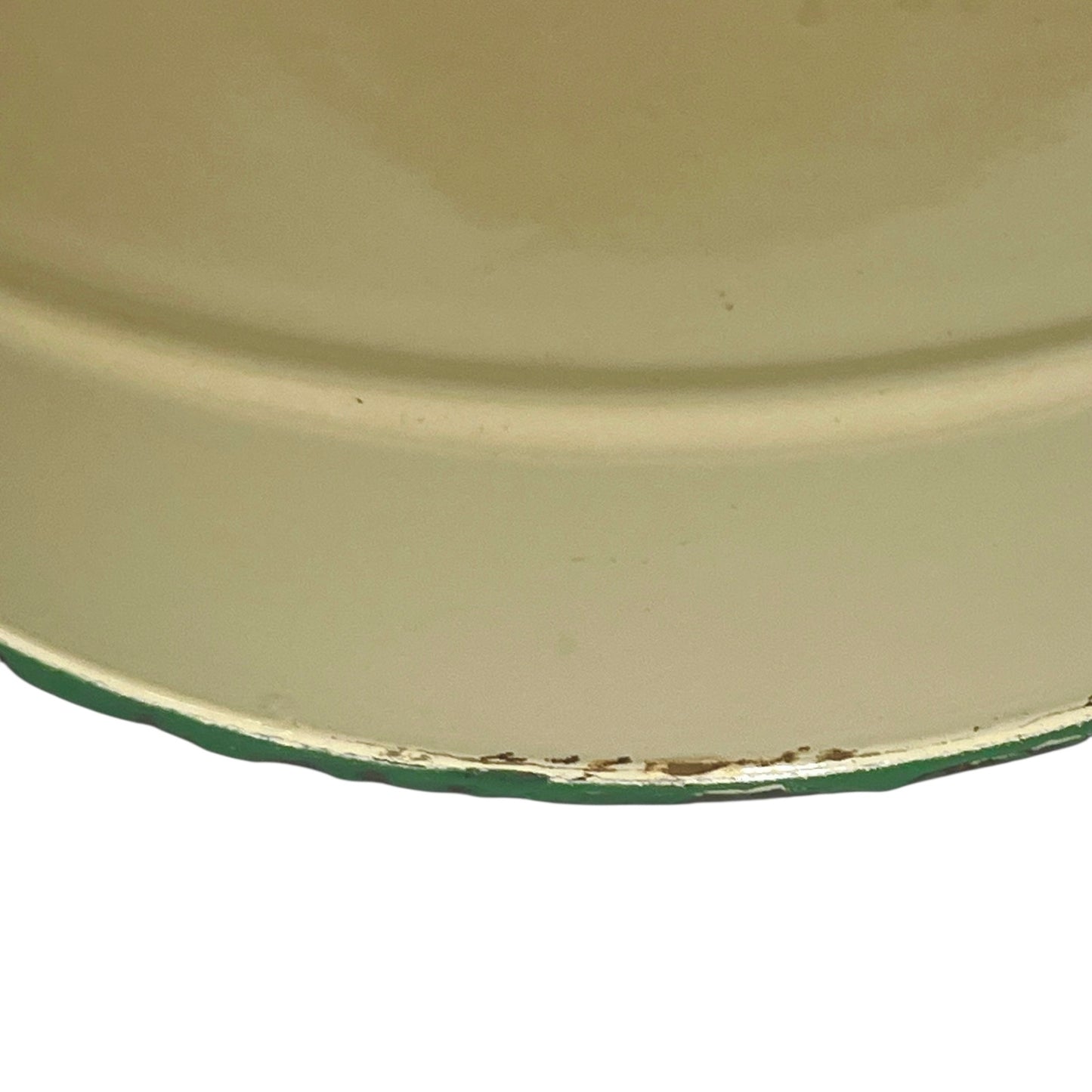 Close up of French vintage cream and green enamel bucket with a lid and handle on a white background