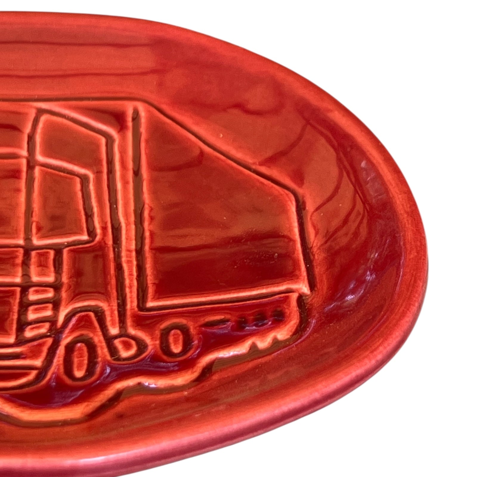 Renault Truck Collectible Trinket Tray, dark red oval shaped with a truck design on the front