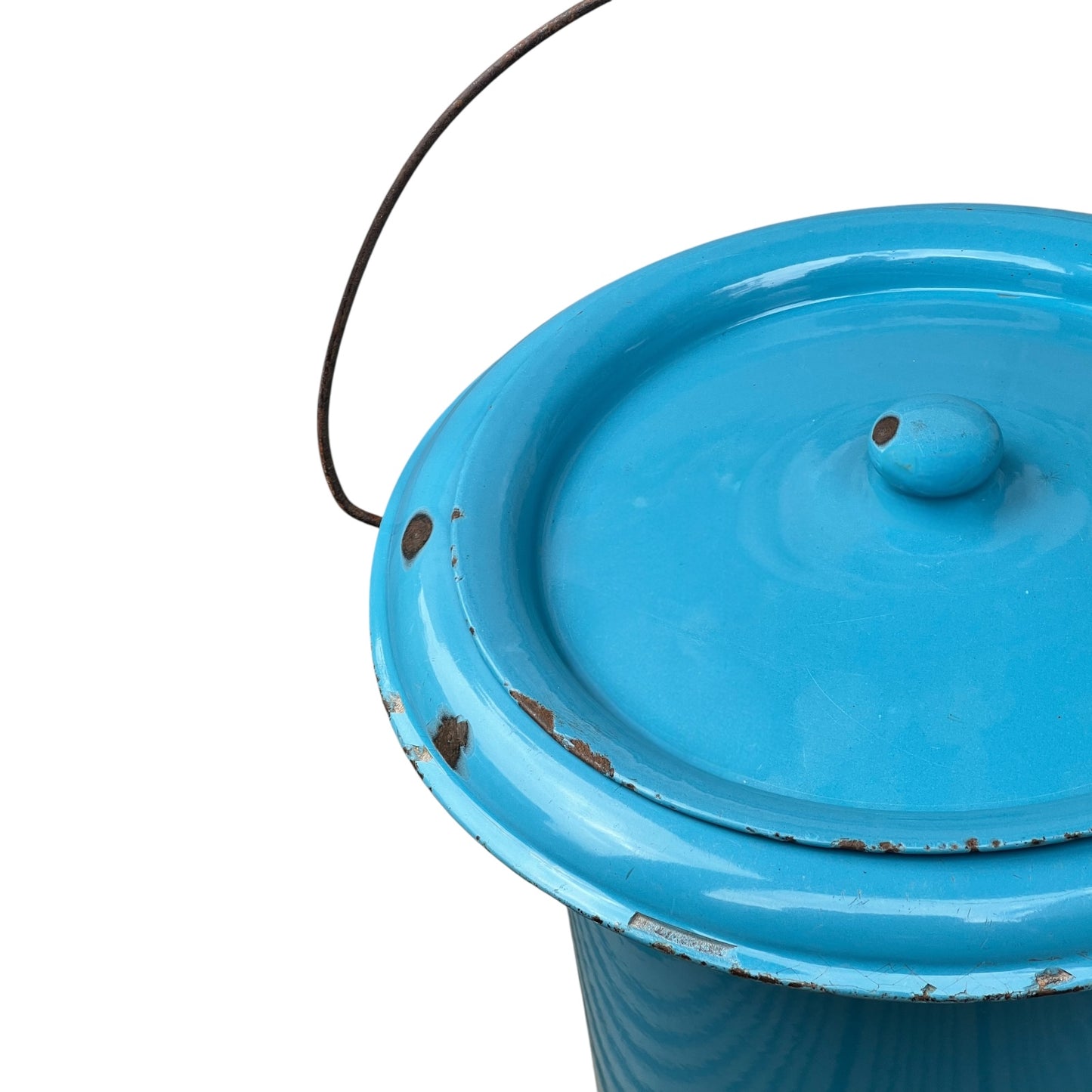 Blue metal bucket with a wooden handle on a white background
