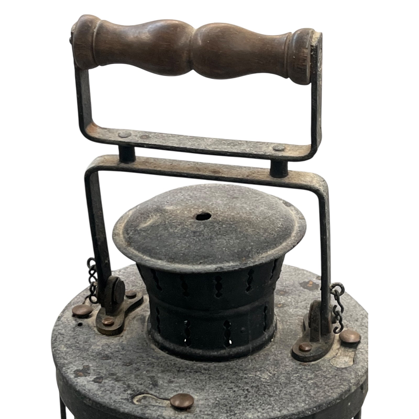 Vintage metal and wood pulley system on a white background