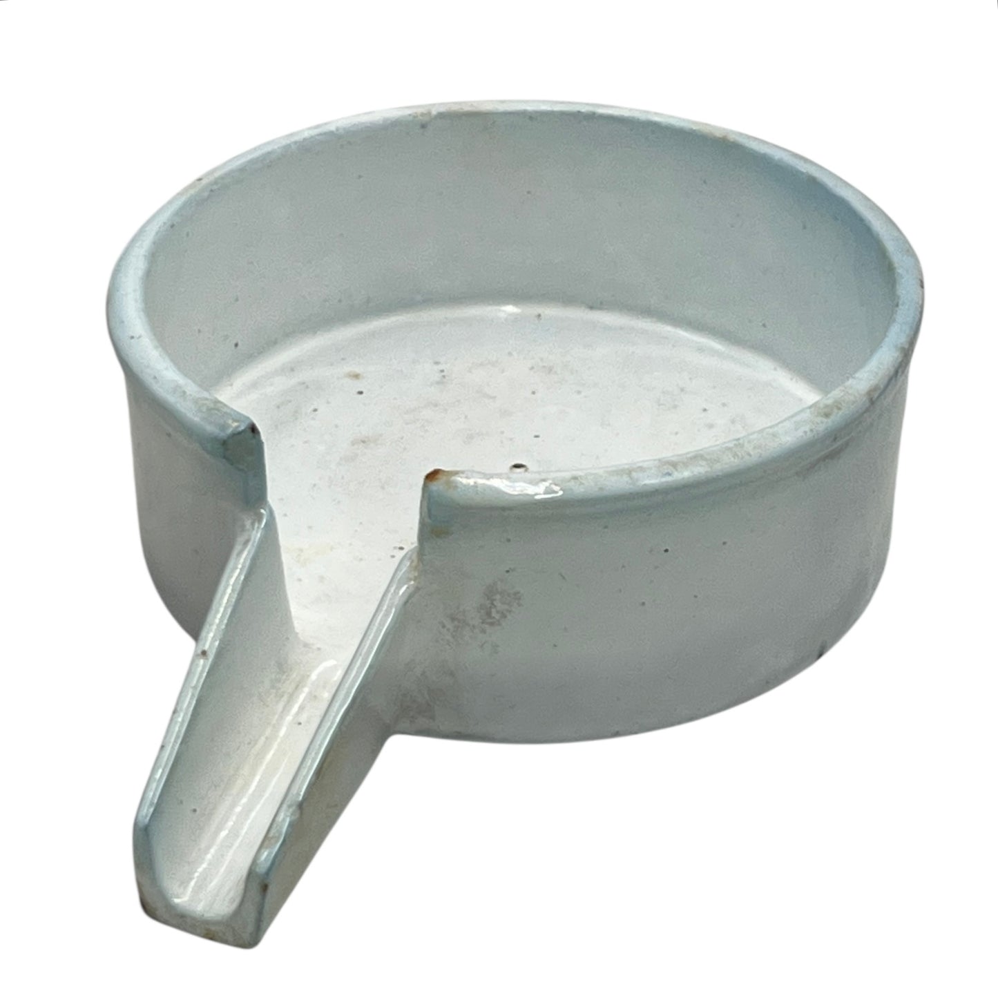 Close-up of a vintage French fruit press with an enamel pot on a white background
