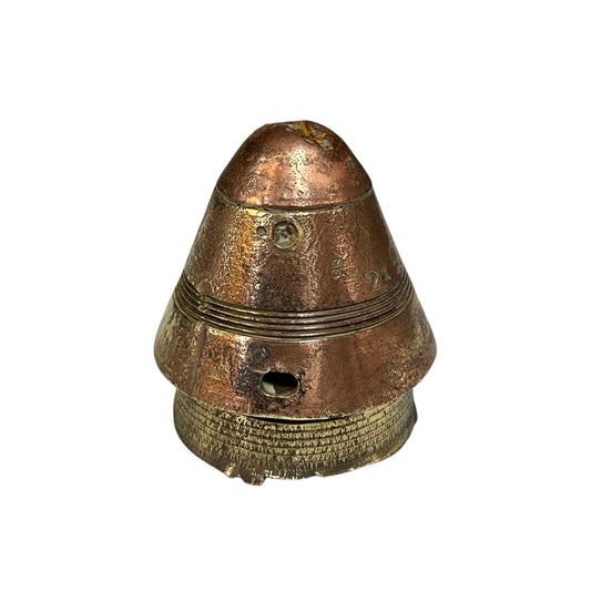 WW1 relic brass fuse number 102, ideal as a paperweight n a white background