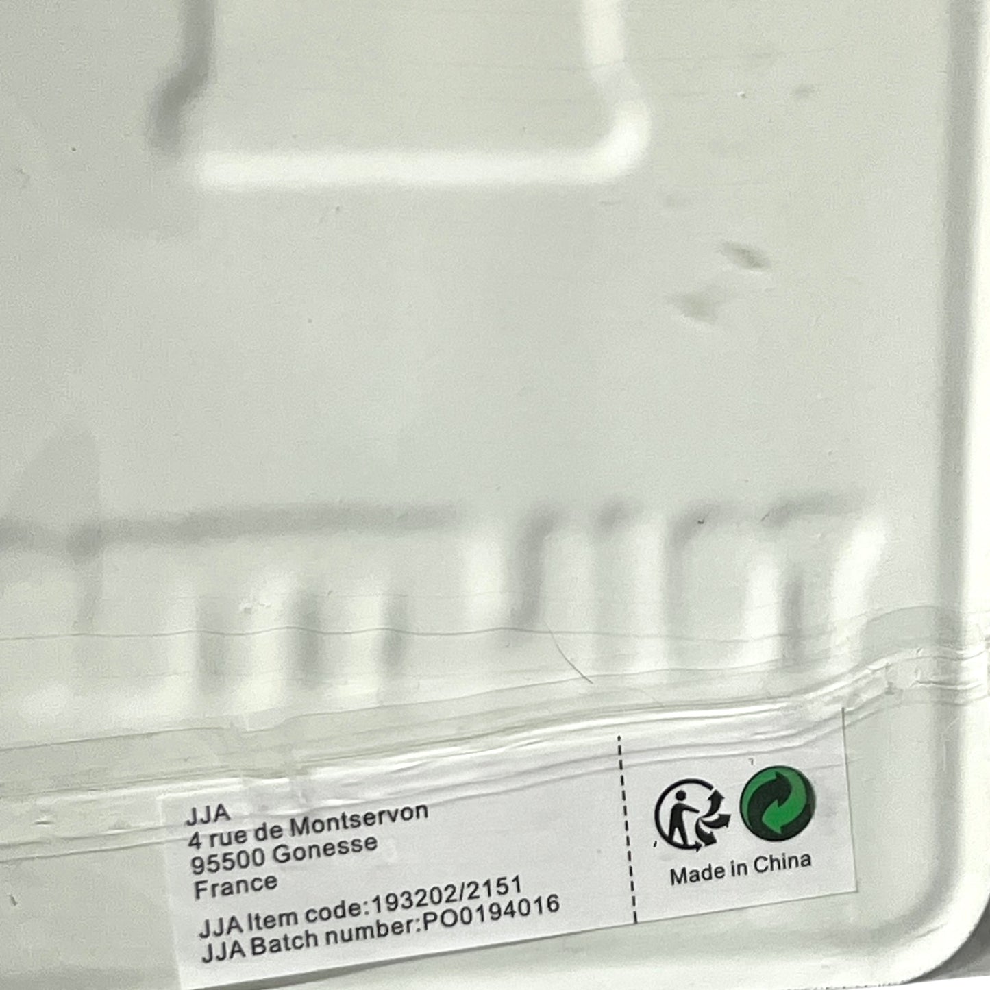 Close-up of a label containing text and logos.