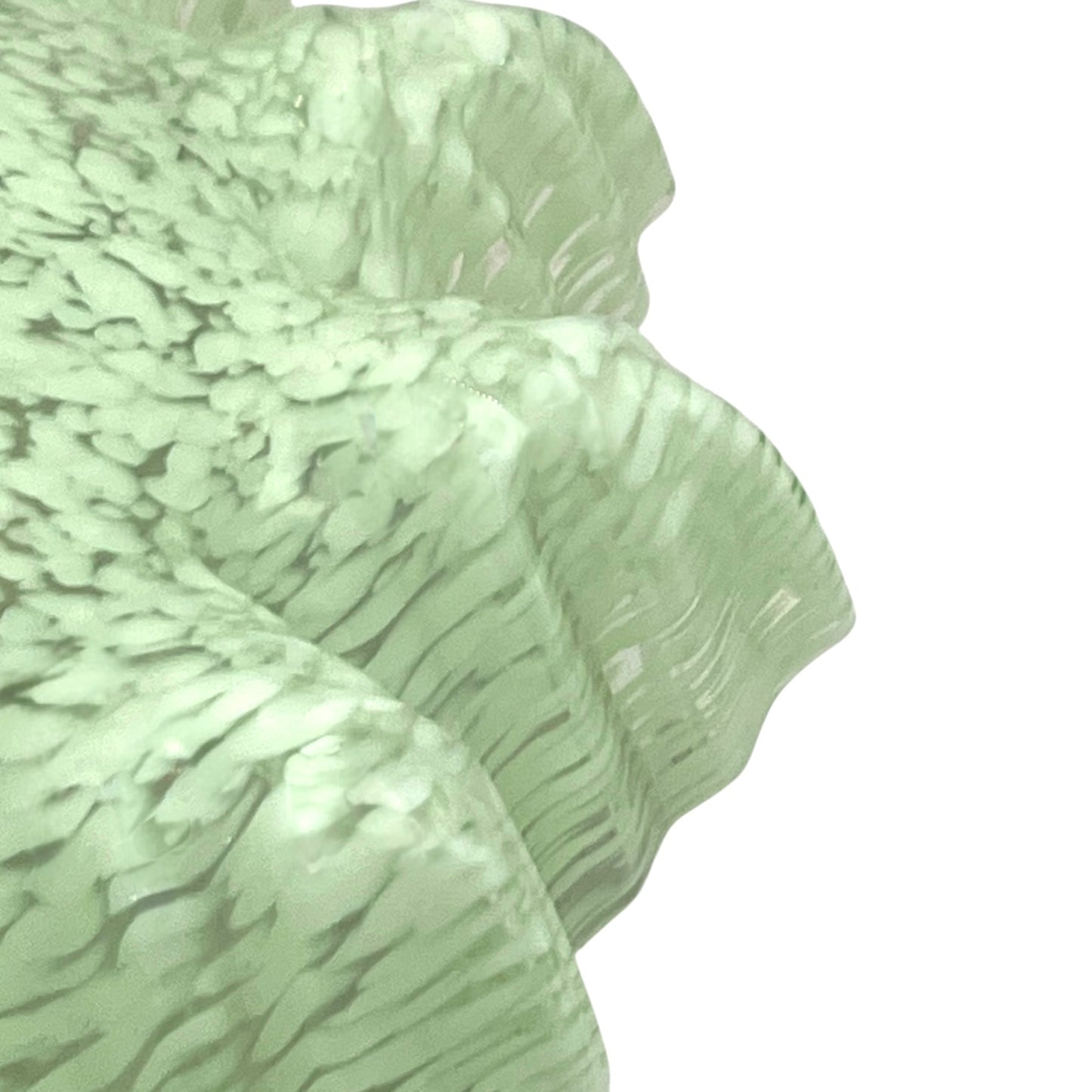 close up of light green milk glass pendant shade on a white background