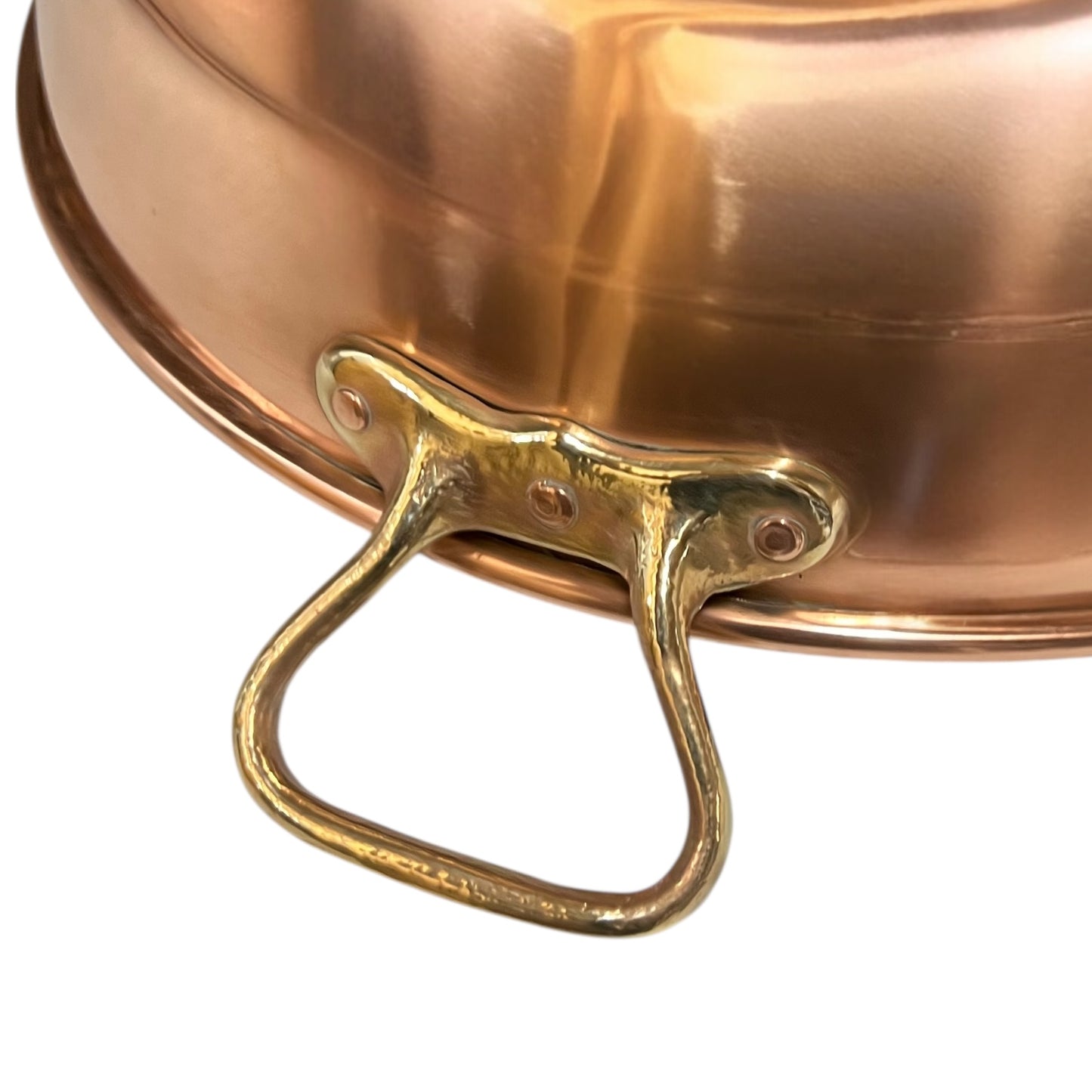 Close up of a copper basin sink on a white background