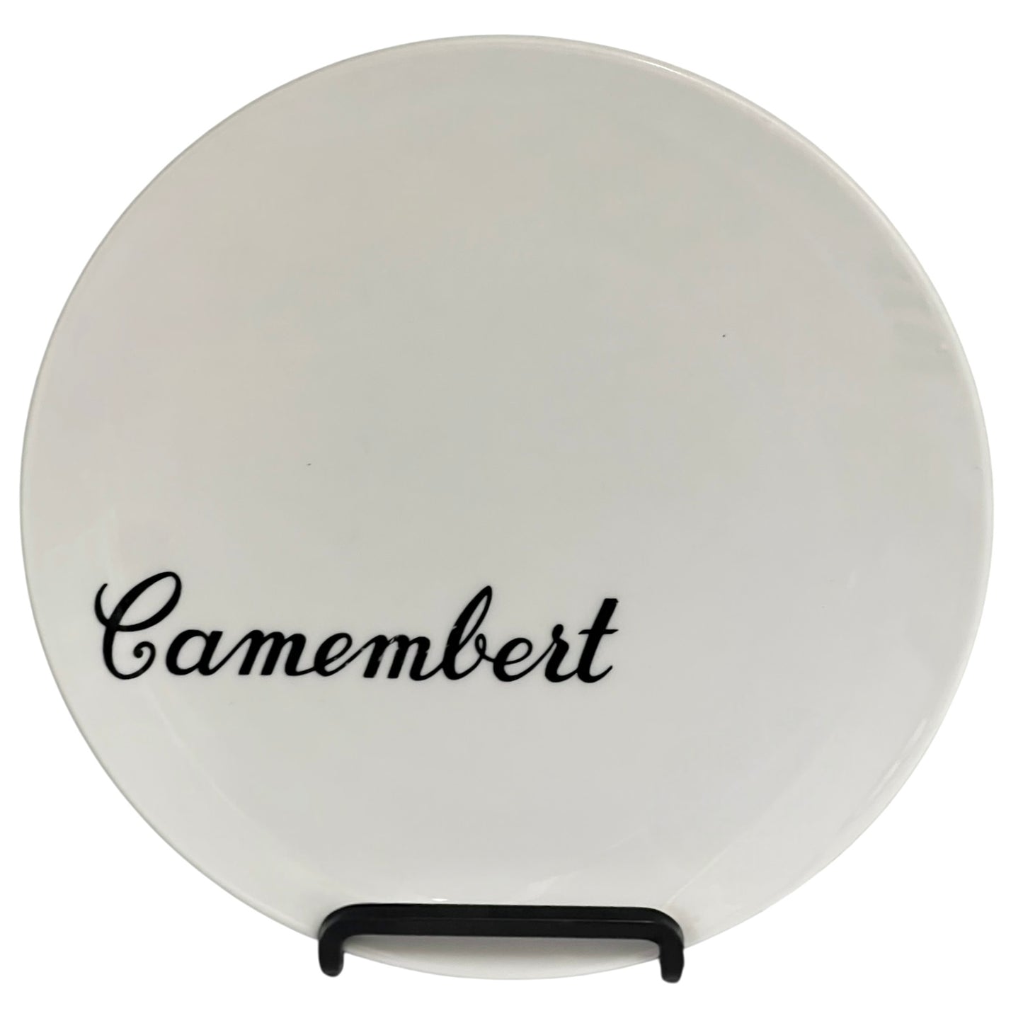 White ceramic plate with 'Camembert' text on a stand against a white background