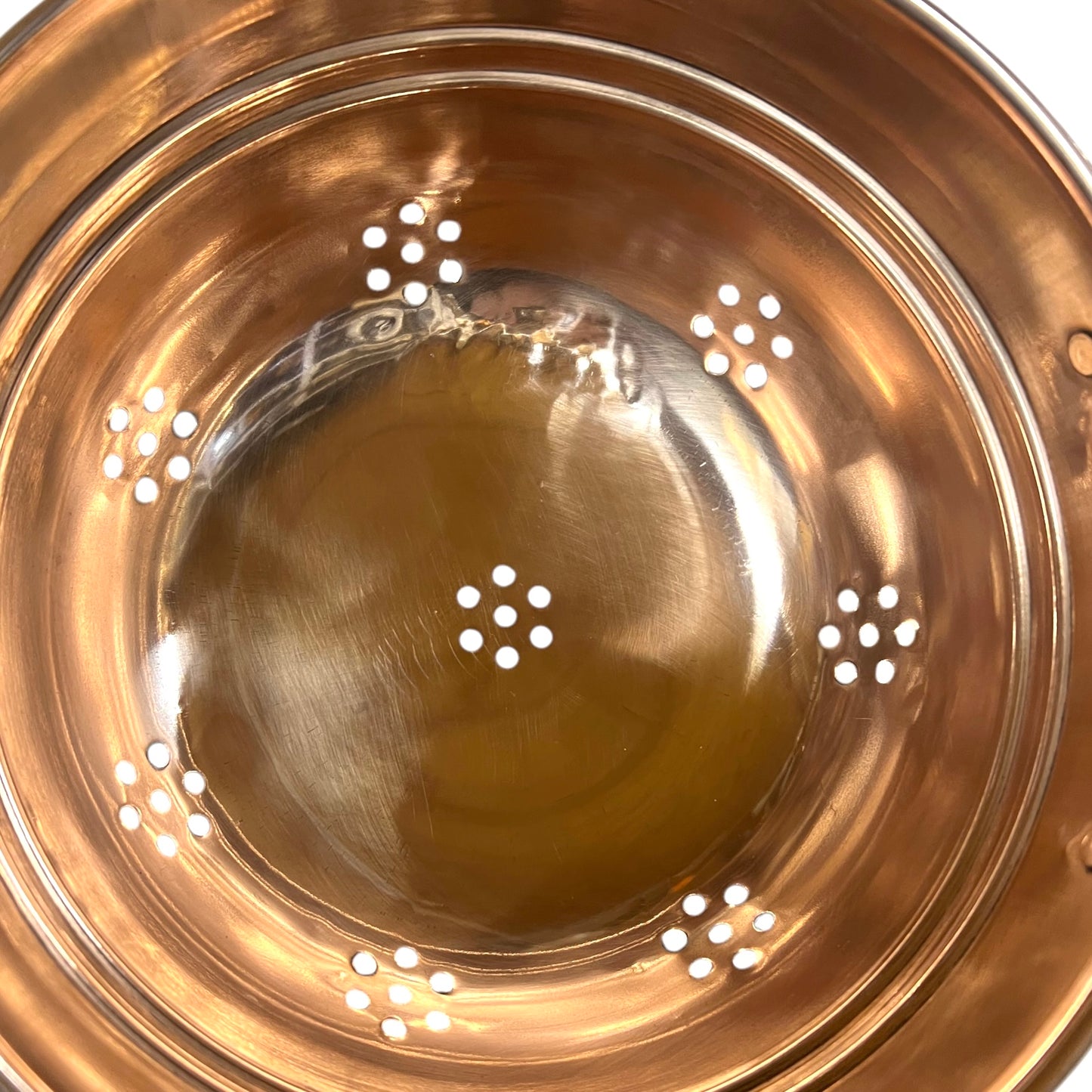 close up view of French Copper Sieve with Brass Handles