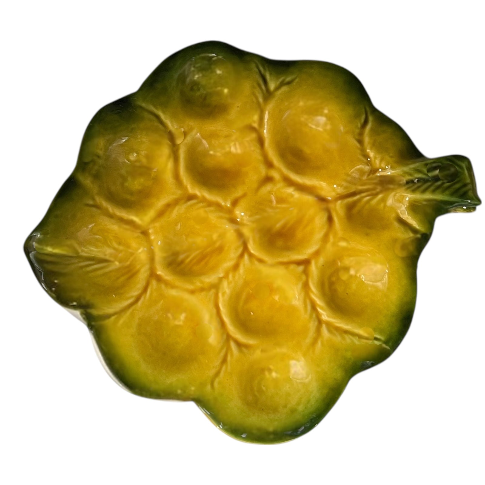 Yellow and green ceramic leaf-shaped snail escargots plate on a white background