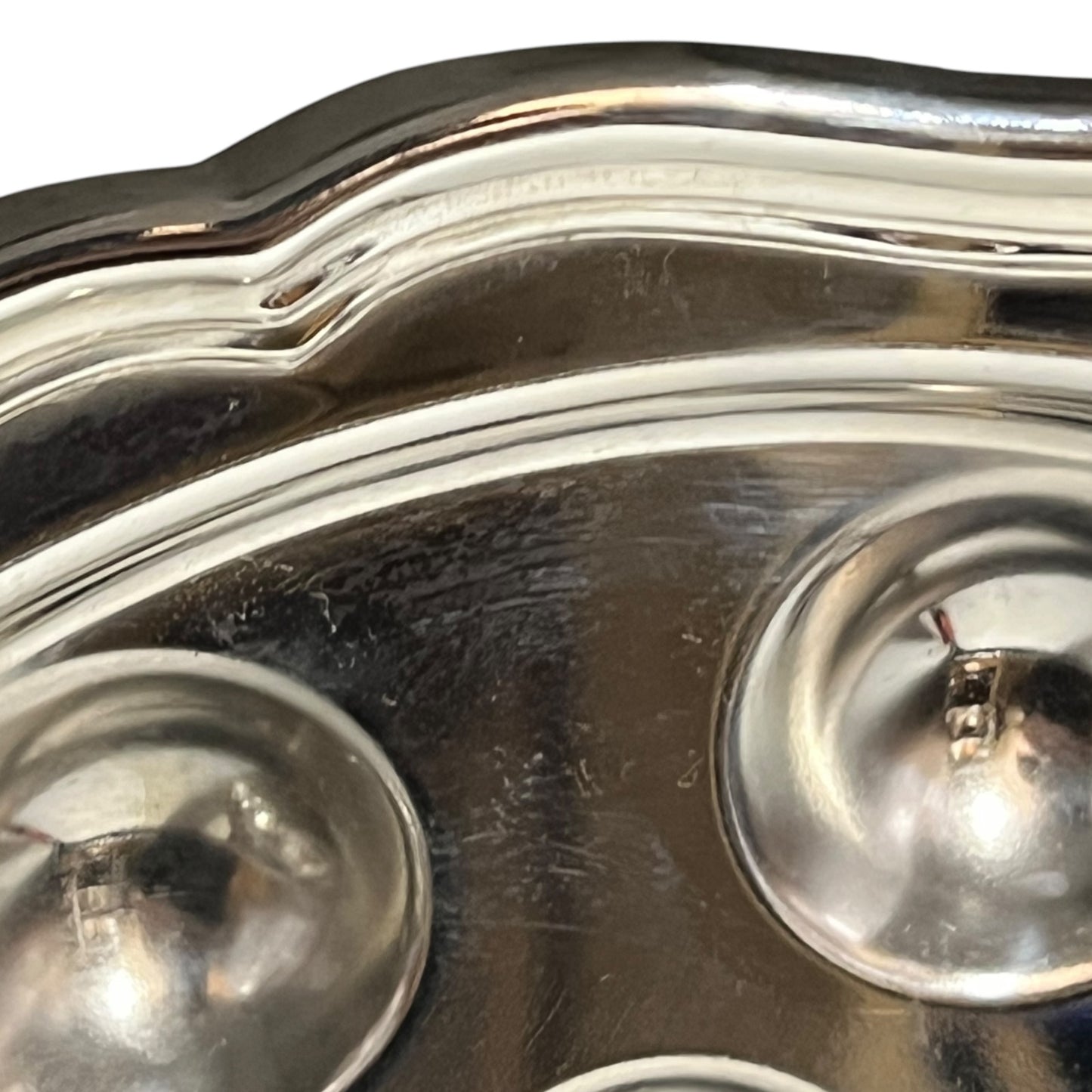 close up stainless steel snail plate