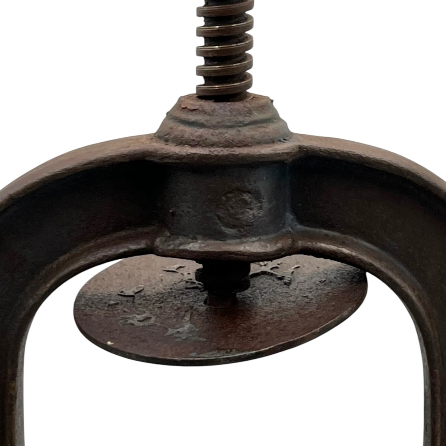 Close-up of a vintage French fruit press with an enamel pot on a white background