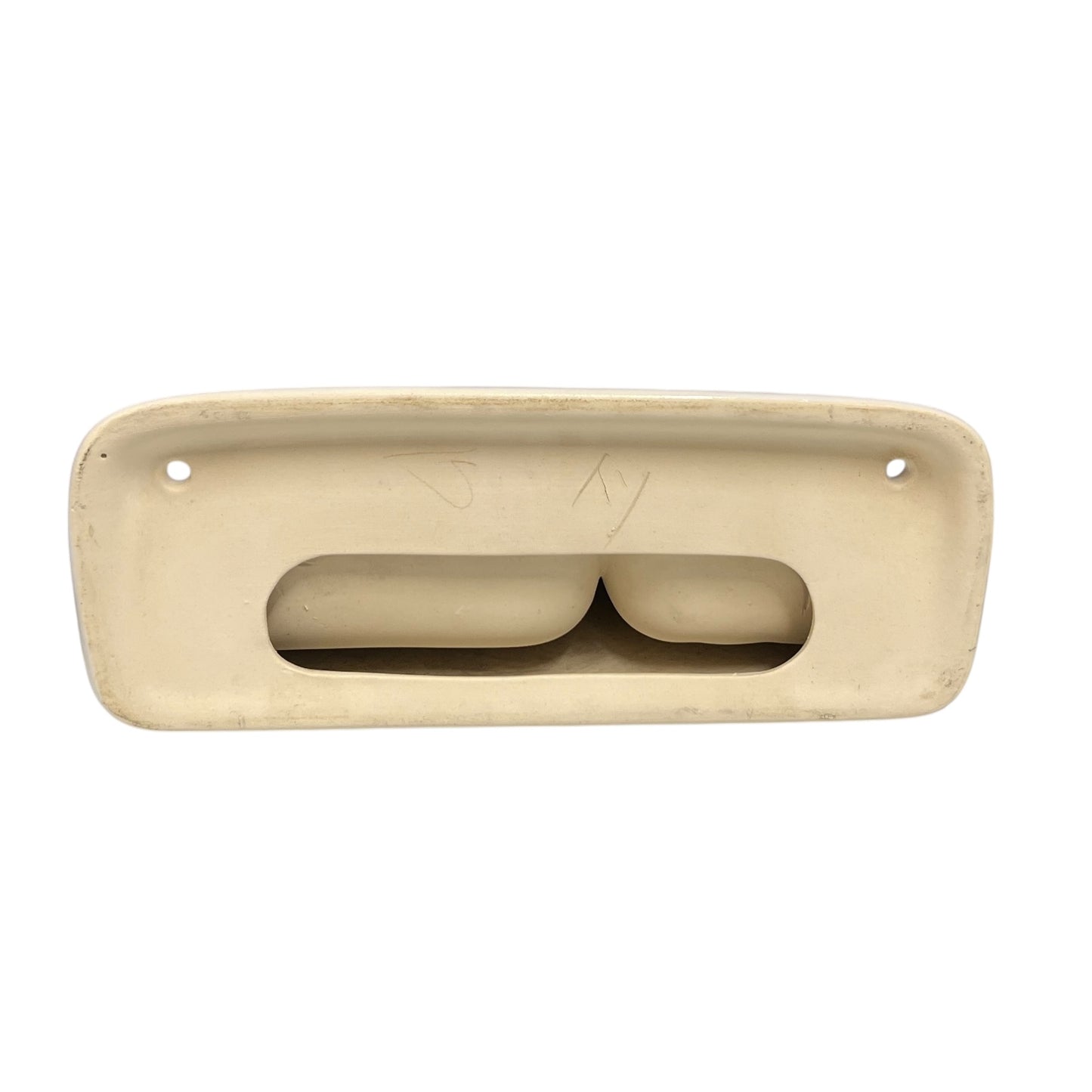 back image of porcelain soap dish showing mounting holes