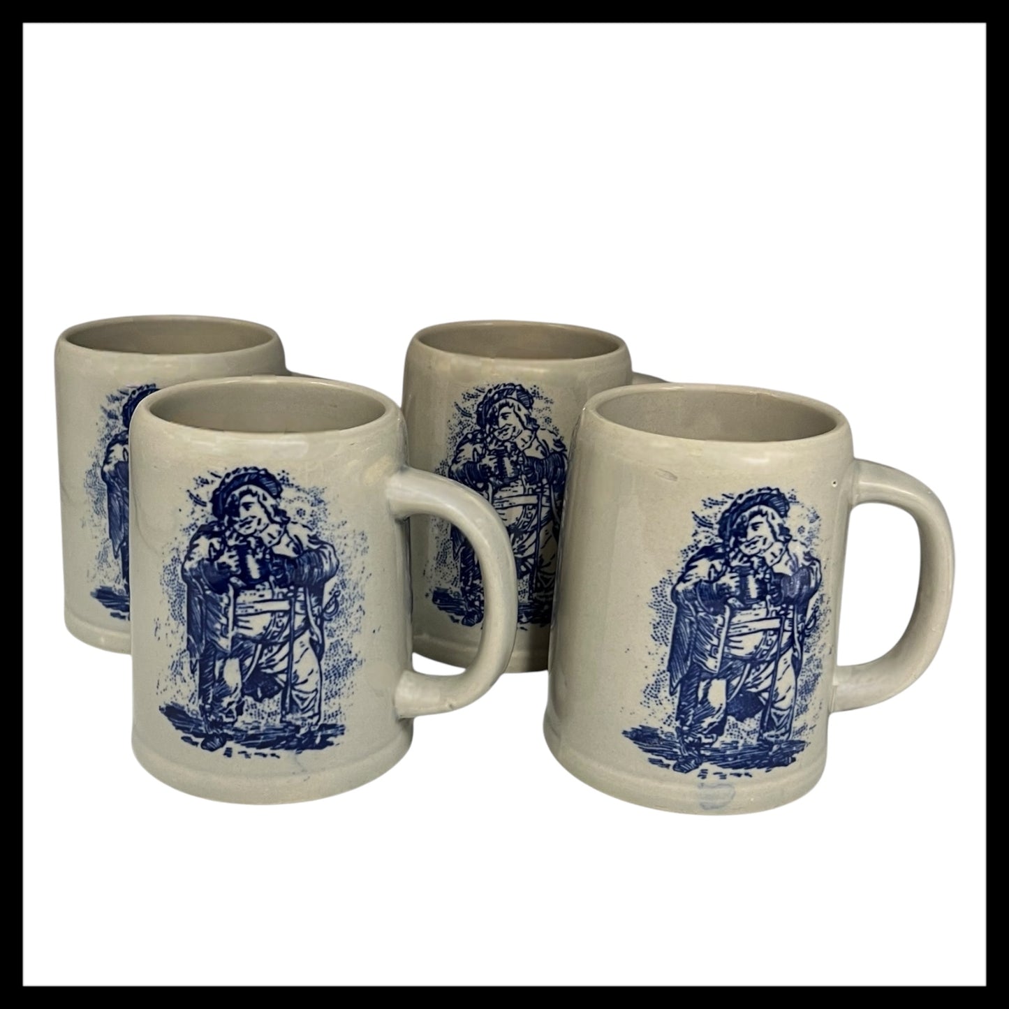 set of 4 grey ceramic beer steins with a blue pattern on the front on a bar counter