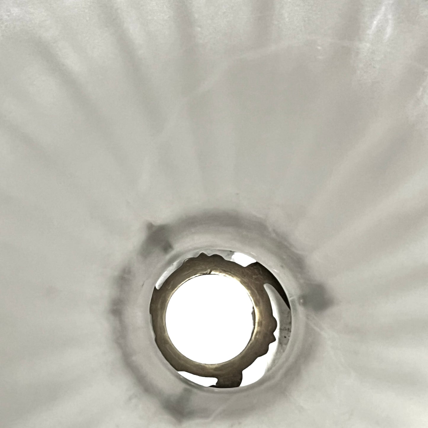 Close up of a vintage French glass lamp shade
