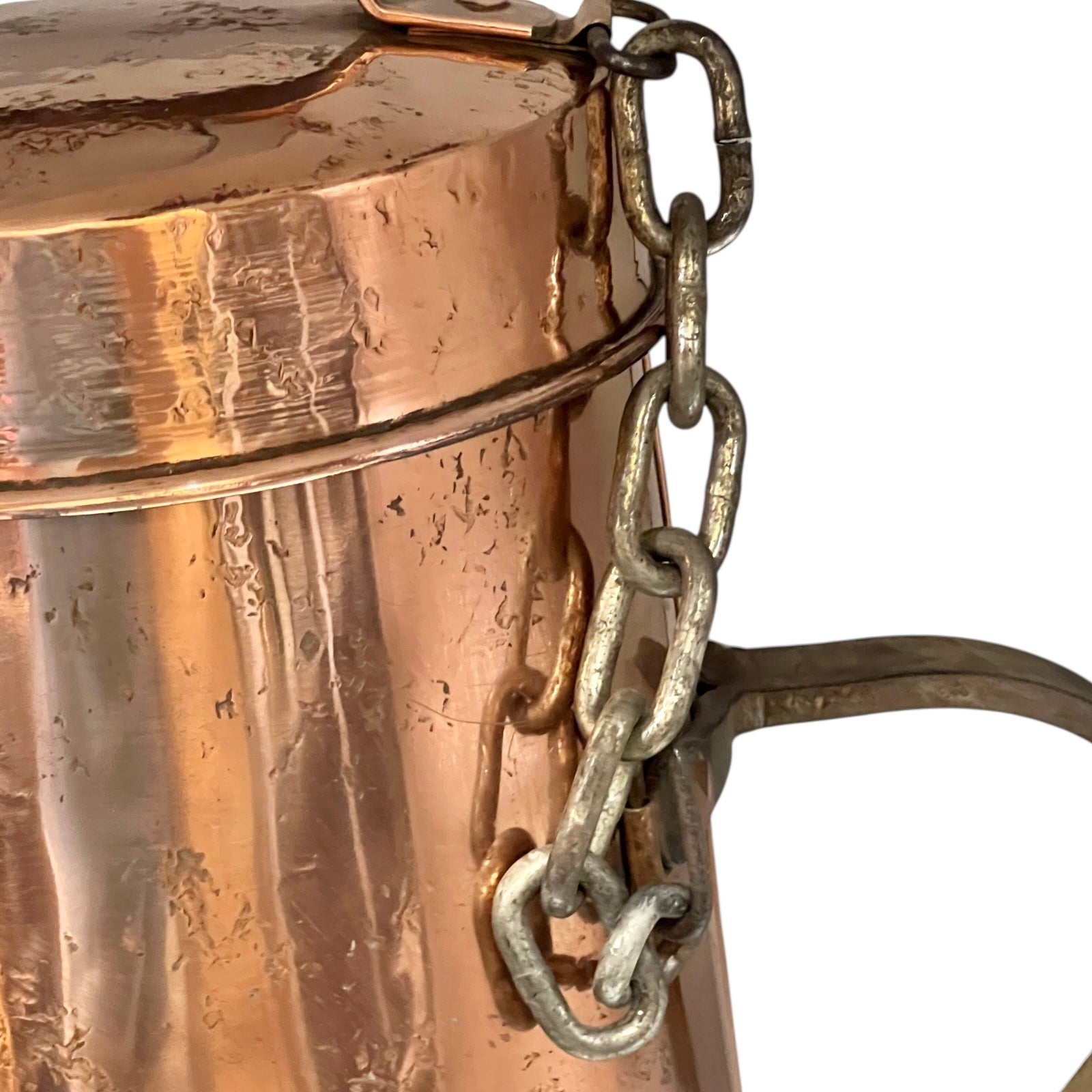Close-up of a copper milk churn with a chain handle on a white background