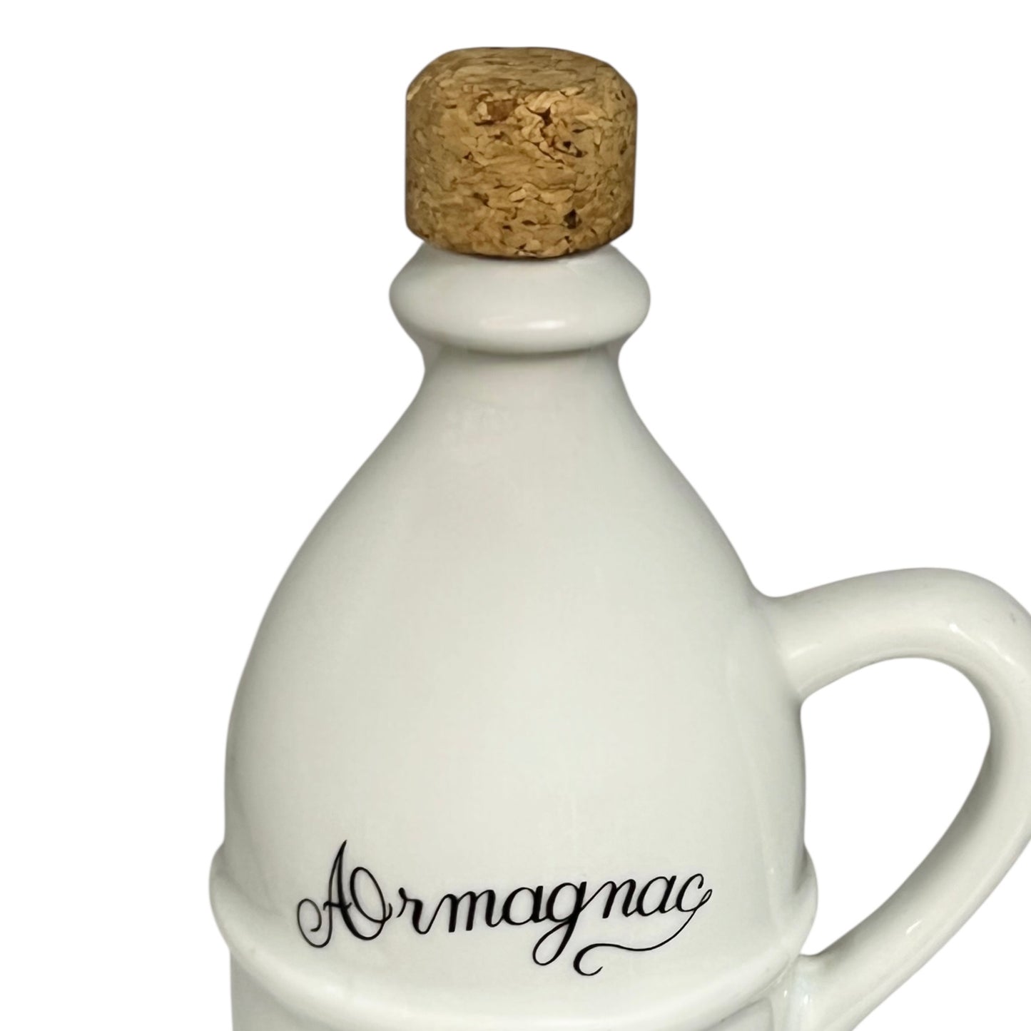 White ceramic Armagnac bottle with cork stopper on a white background