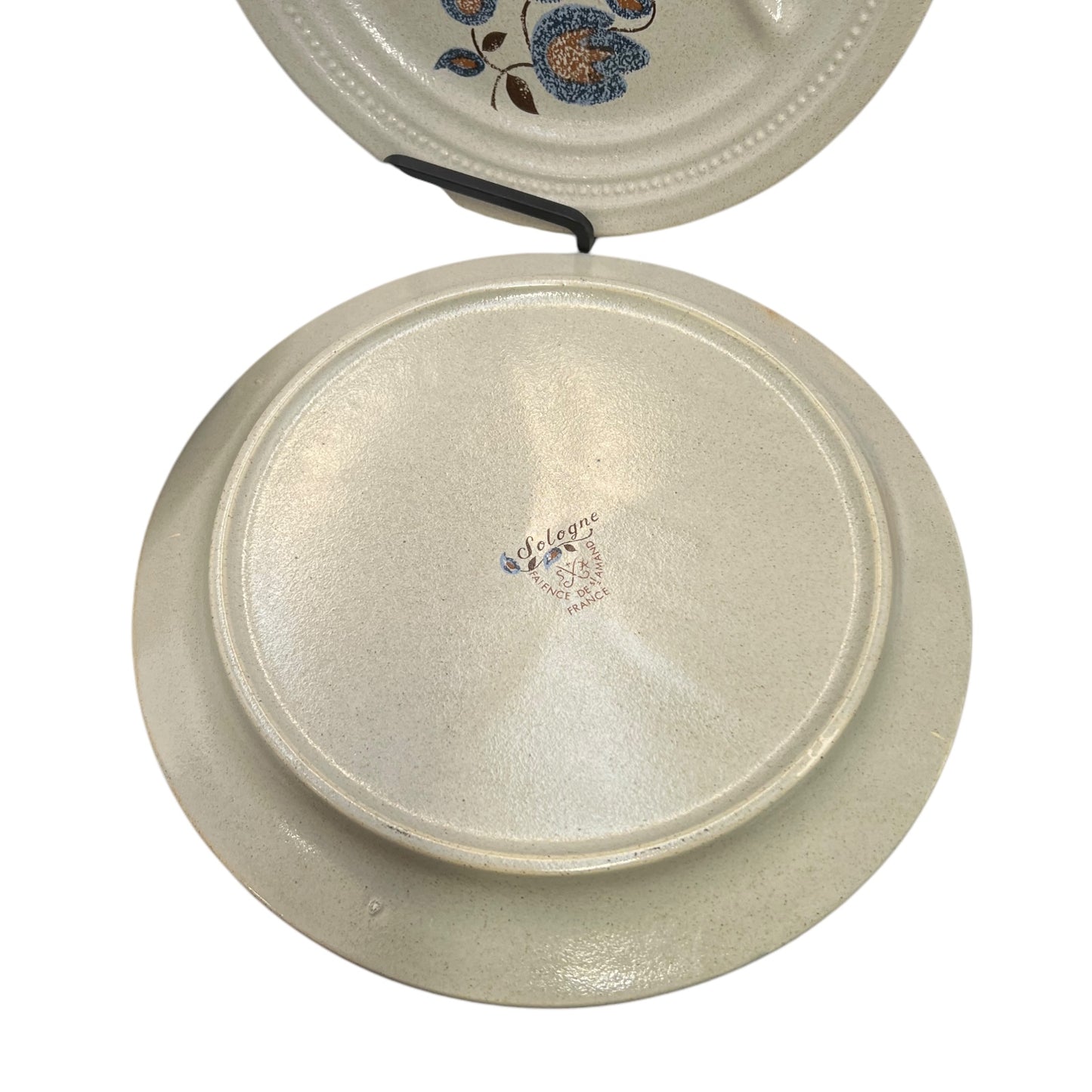 detailed back view of divided French vintage plate