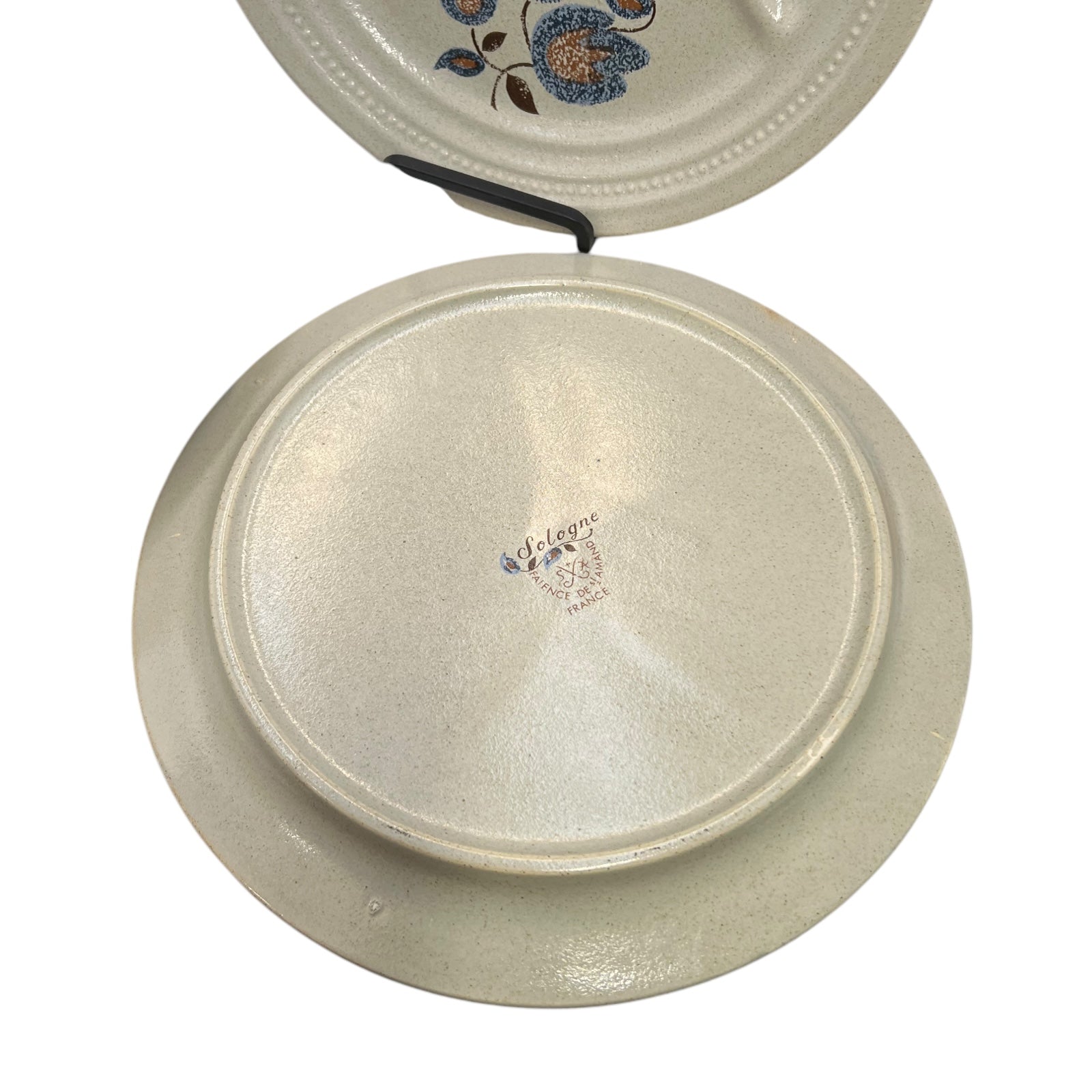 detailed back view of divided French vintage plate