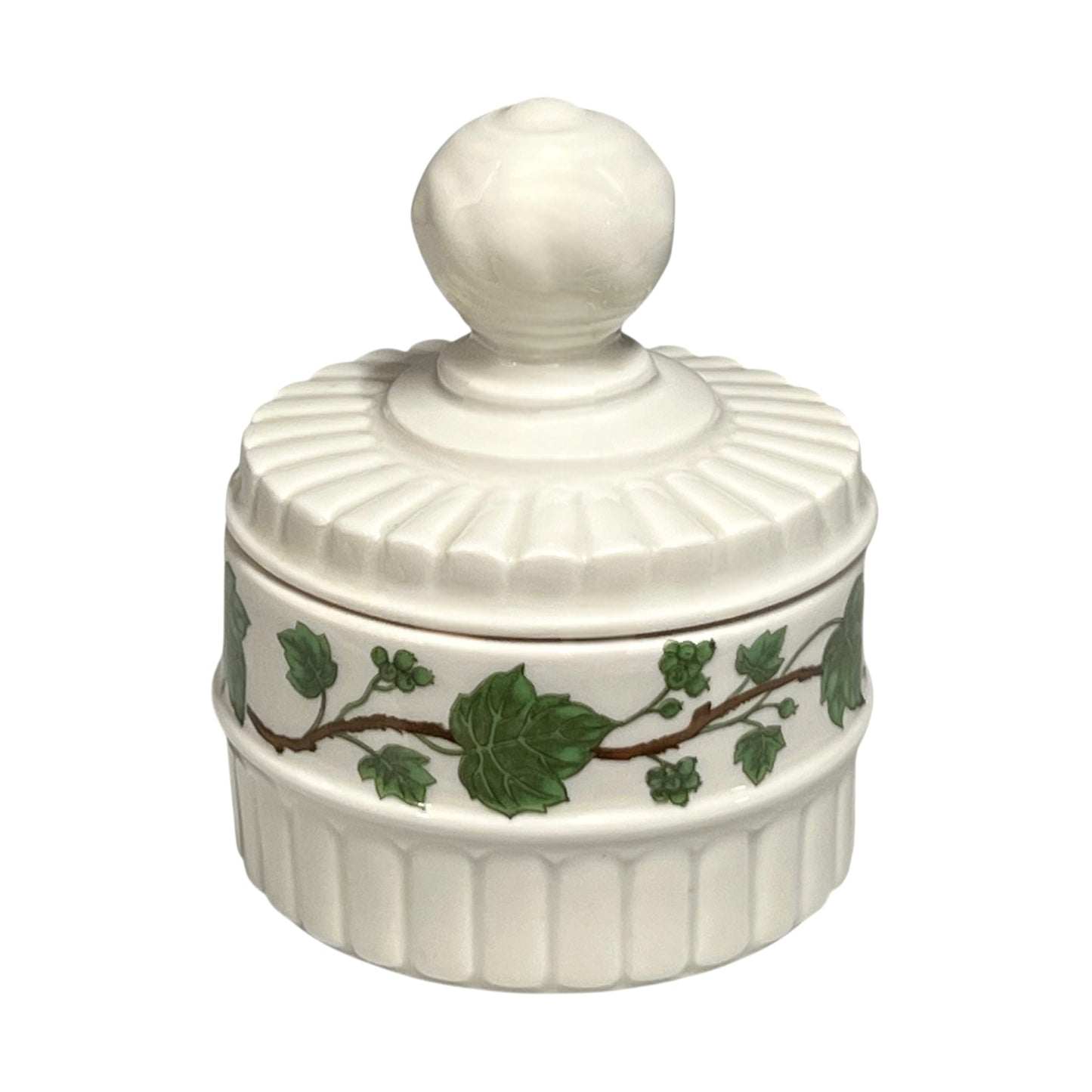 White ceramic jar with decorative lid and green leaf pattern on a white background for sale by All Things French Store