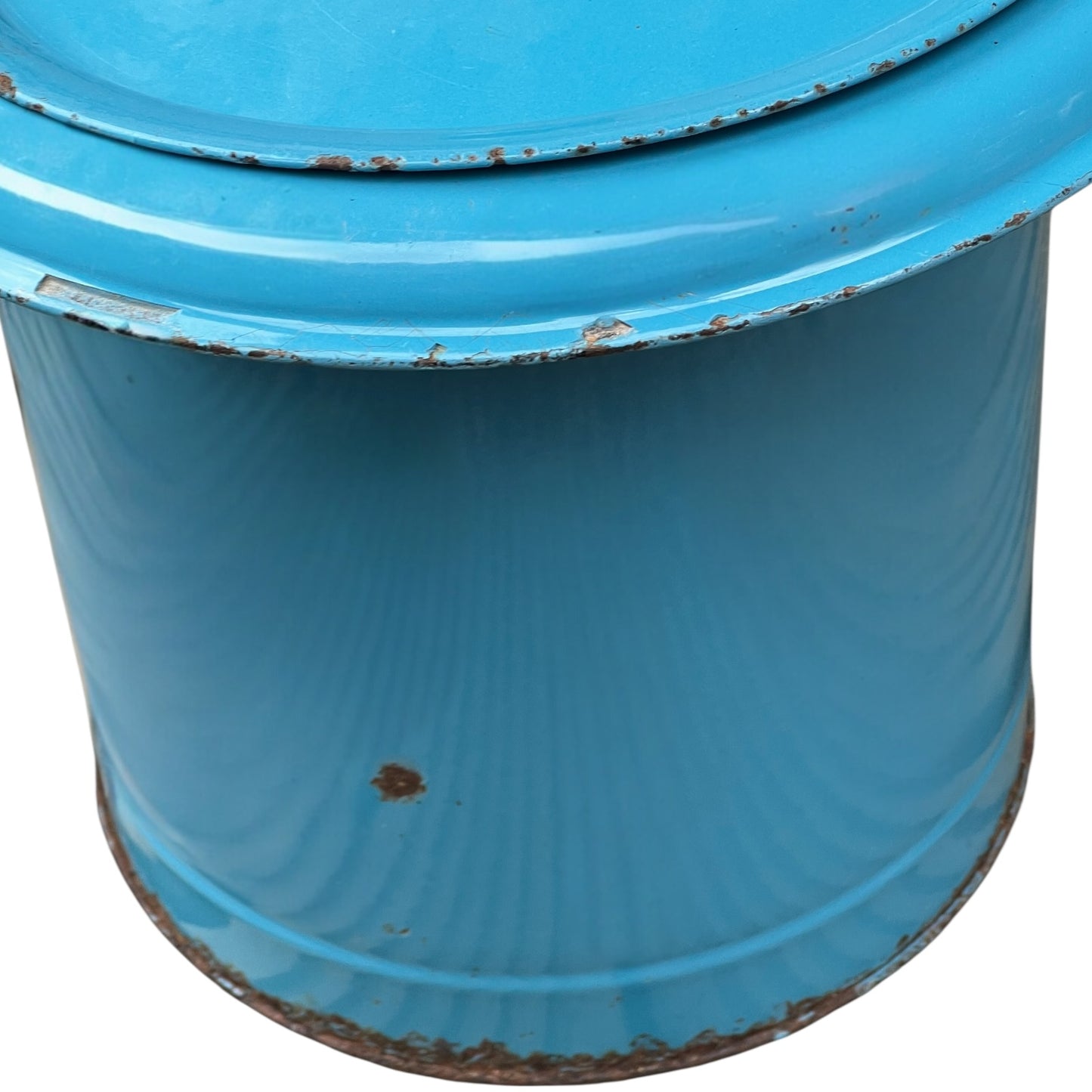 Blue metal bucket with a wooden handle on a white background