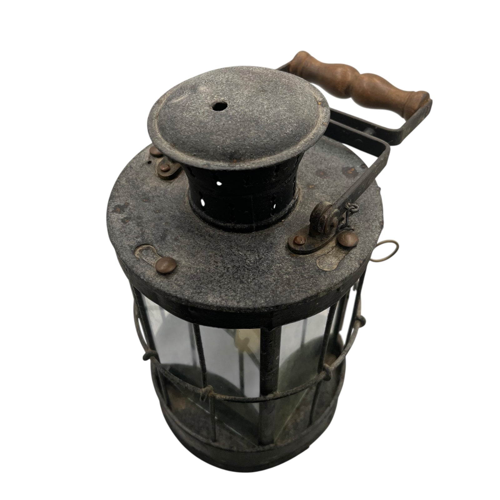 Vintage lantern with a metal handle on a white background