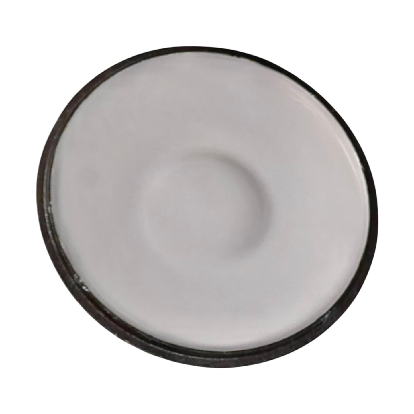Close up of a Le Creuset pot on a white background