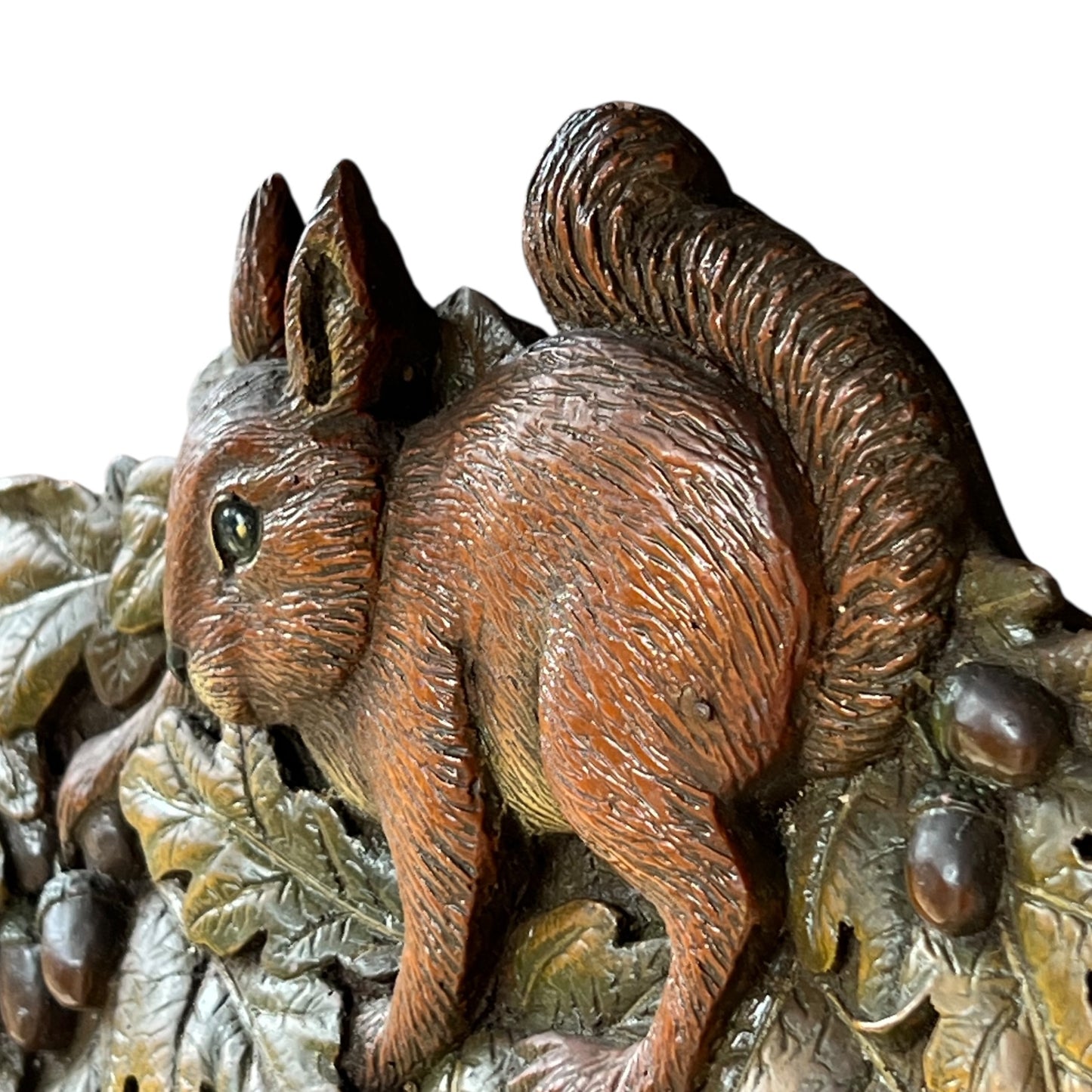 squirrel detail on rim of clock