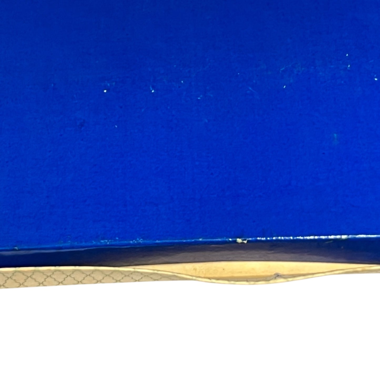 blue box with a subtle pattern on a white background