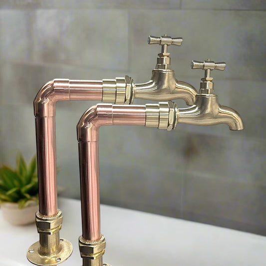 Pair of made to measure copper and brass pillar taps
