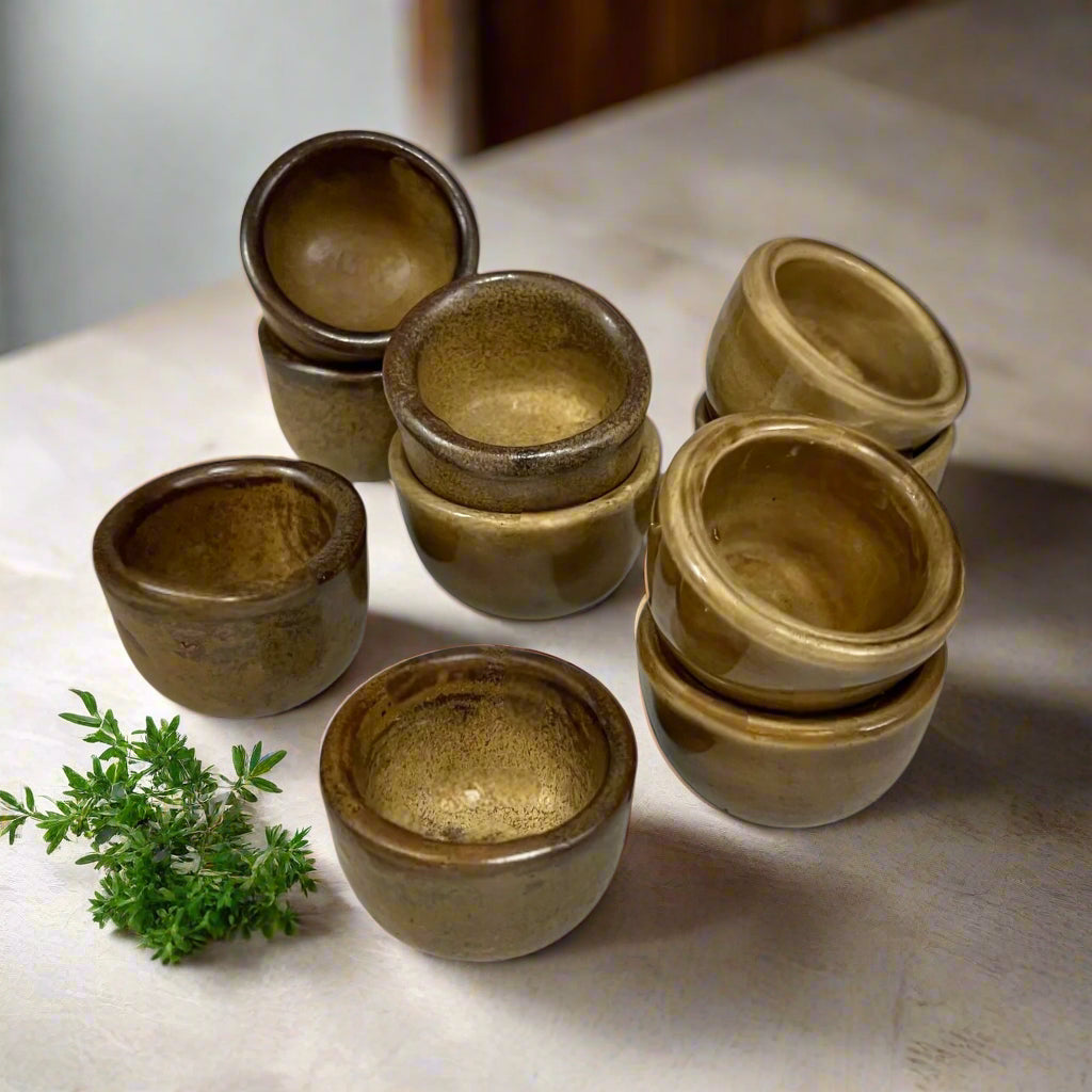Set of 10 Vintage French Ceramic Escargot Cups on a table in a rustic kitchen for sale from All Things French Store