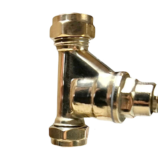 Brass Y-shaped plumbing valve on a white background