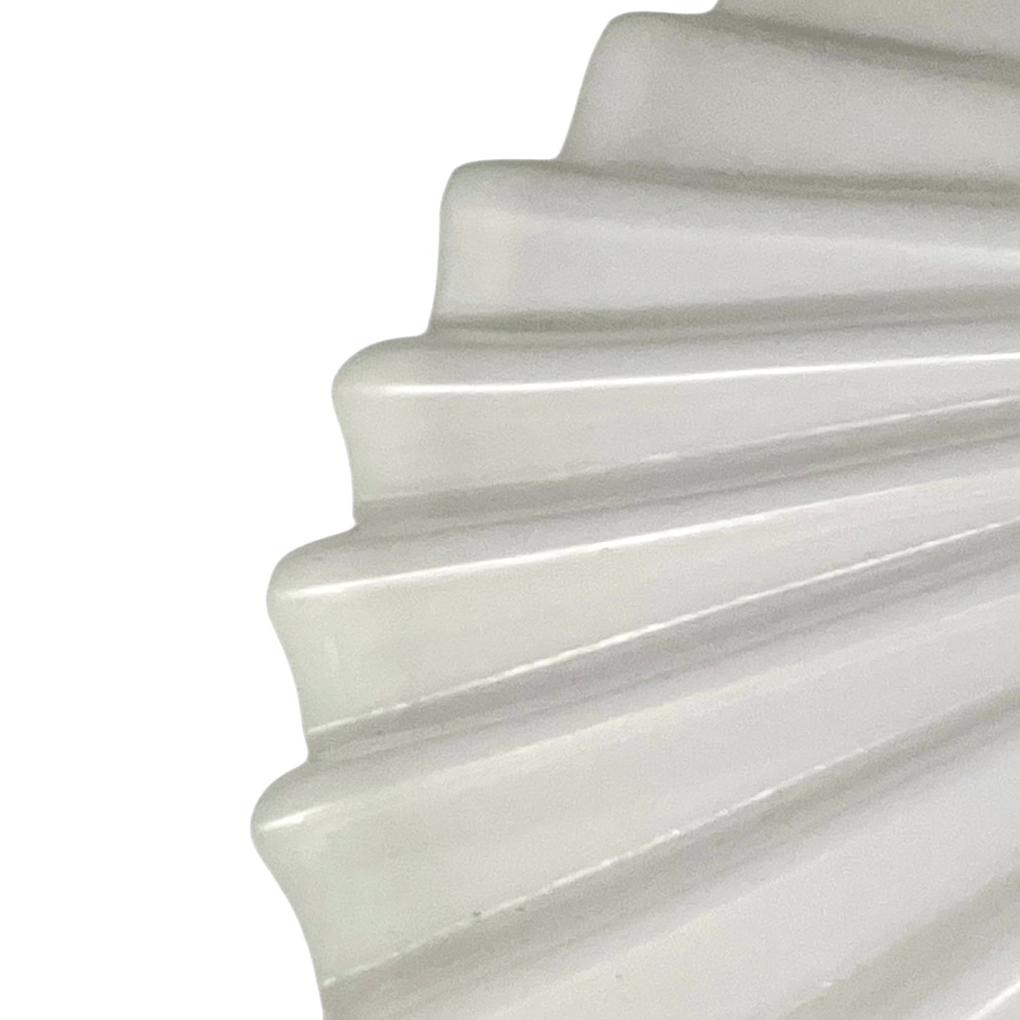 Close up of French glass lampshade on a white background